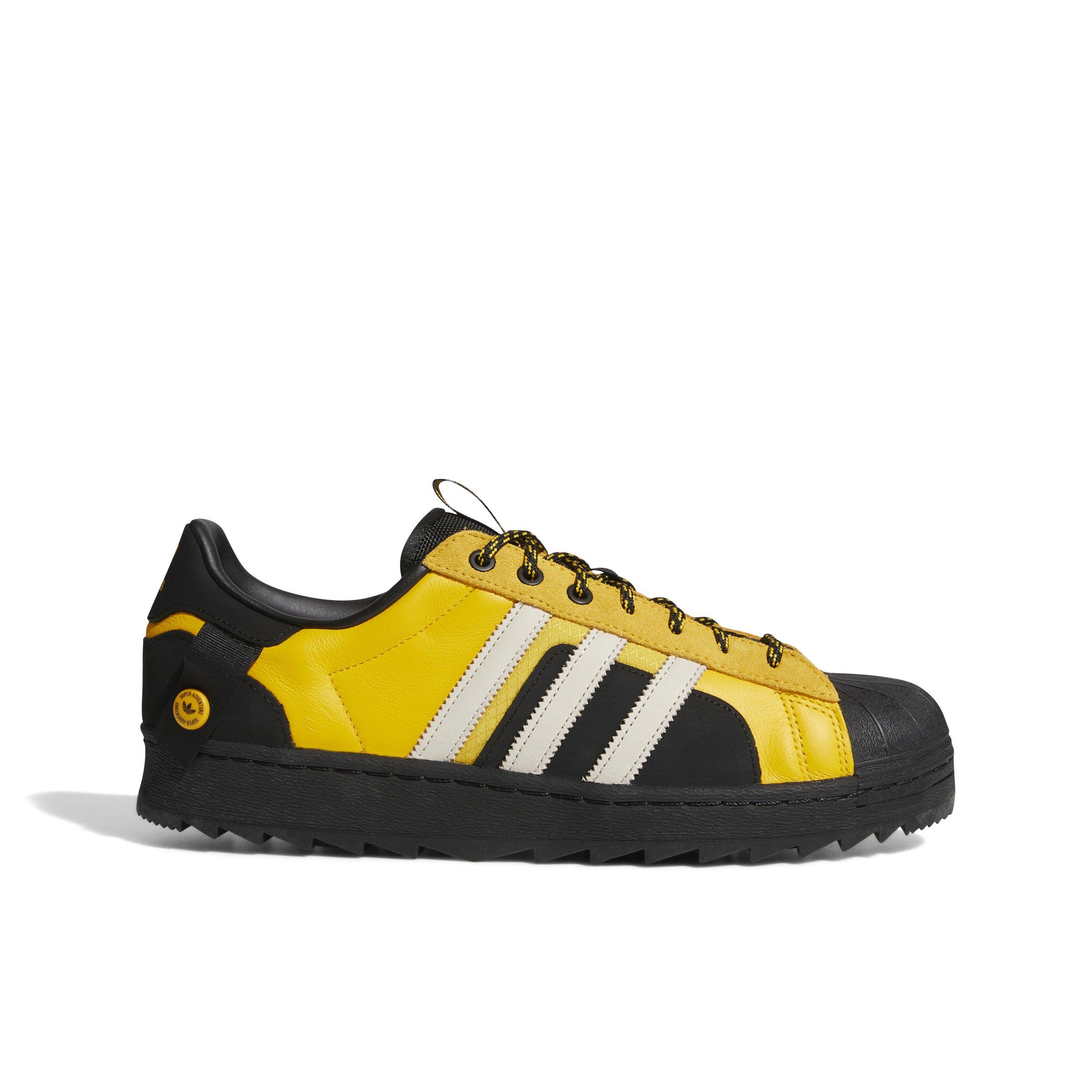 Adidas superstar black yellow sale