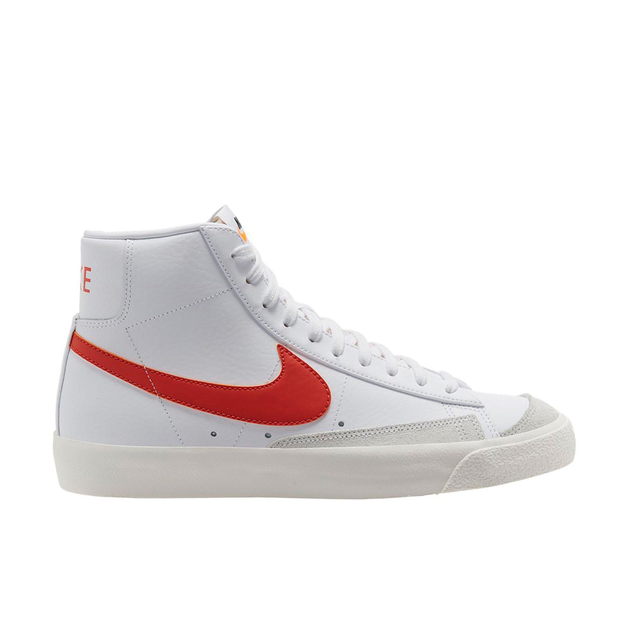 white and orange nike blazers