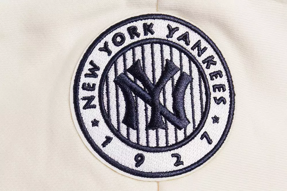 Pro Standard Women's MLB New York Yankees Retro Classic Cropped Fleece Hoodie -Eggshell/Navy - EGGSHELL/NAVY