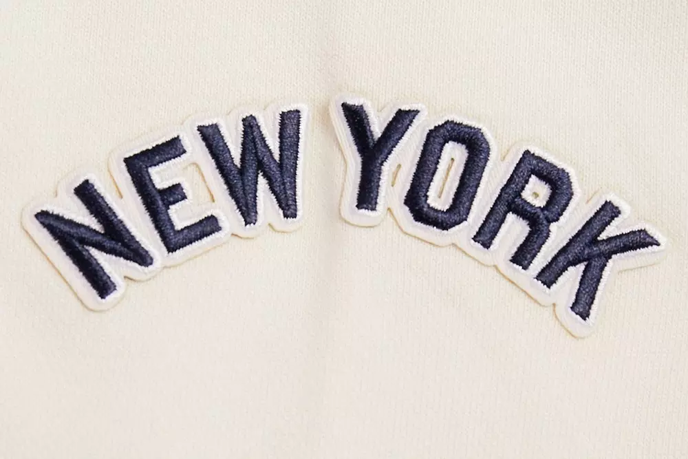 Pro Standard Women's MLB New York Yankees Retro Classic Cropped Fleece Hoodie -Eggshell/Navy - EGGSHELL/NAVY