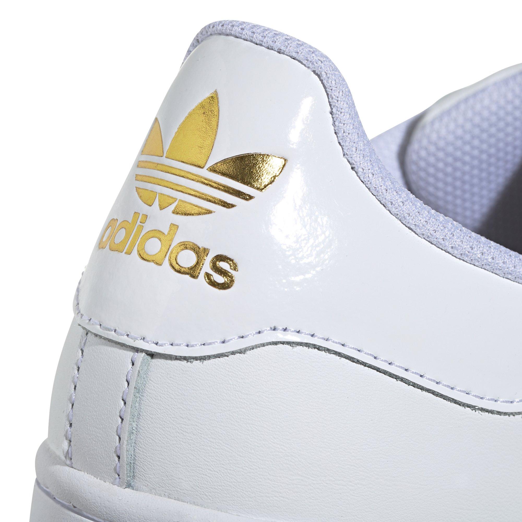 white and gold superstars