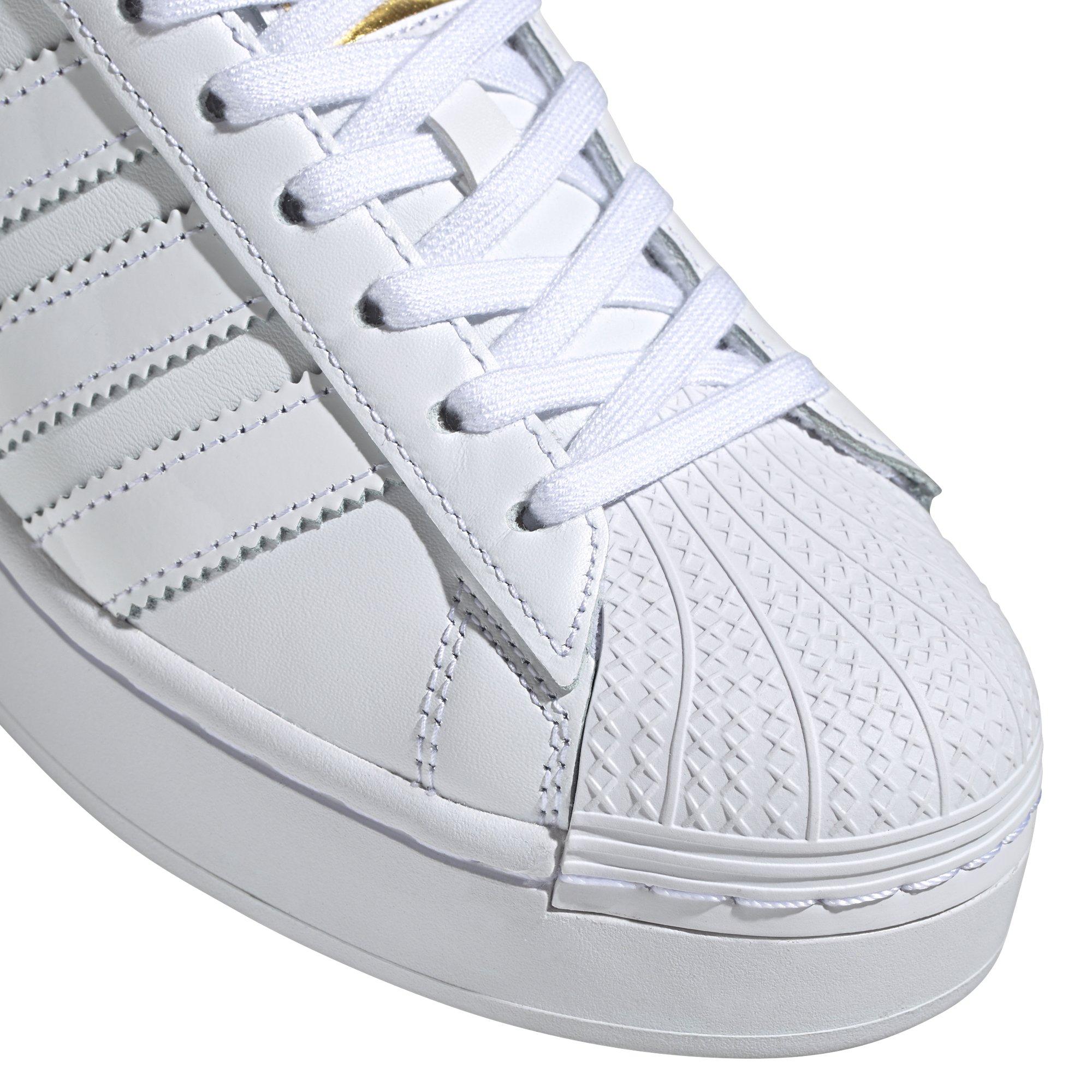 gold and white superstars