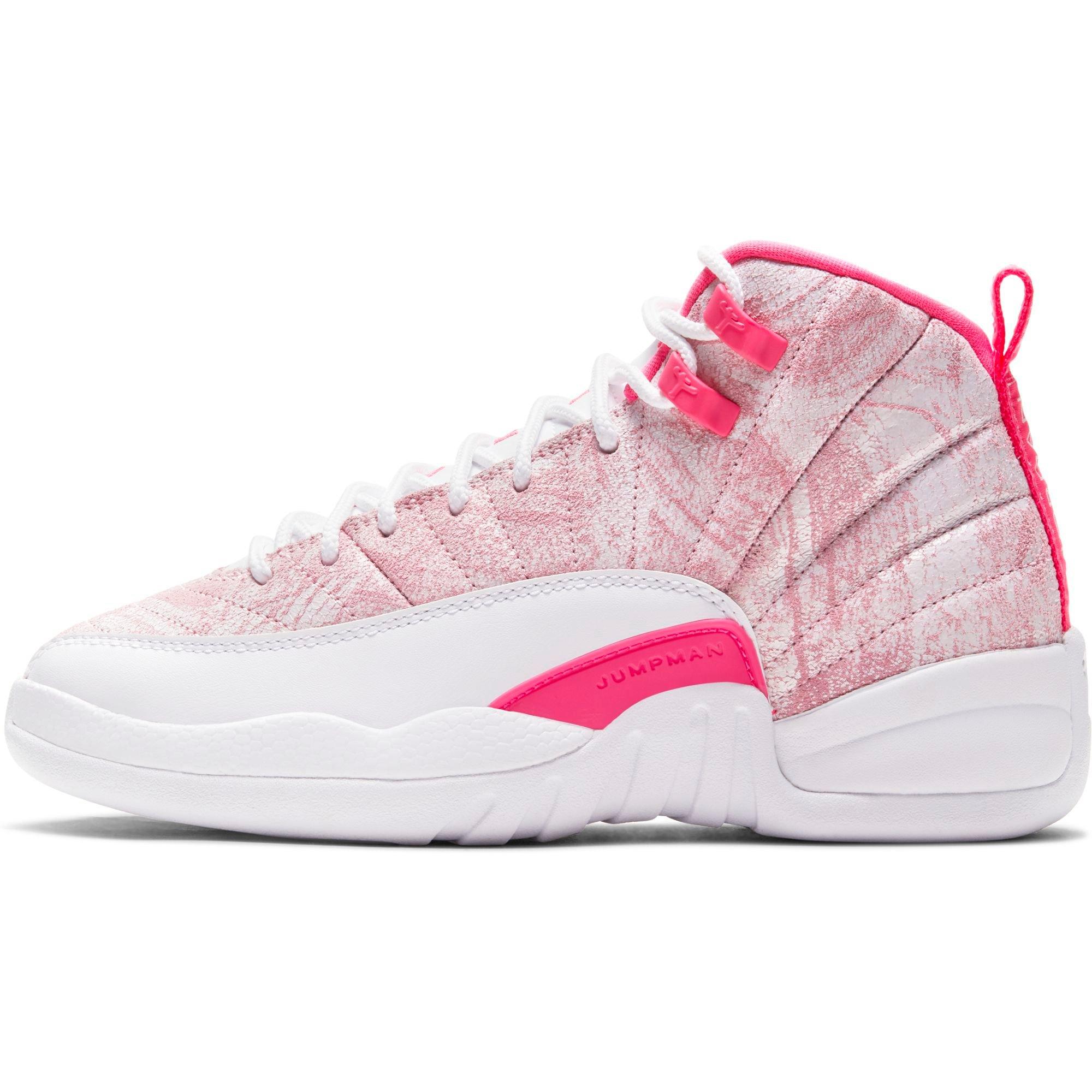 white and pink jordan 12