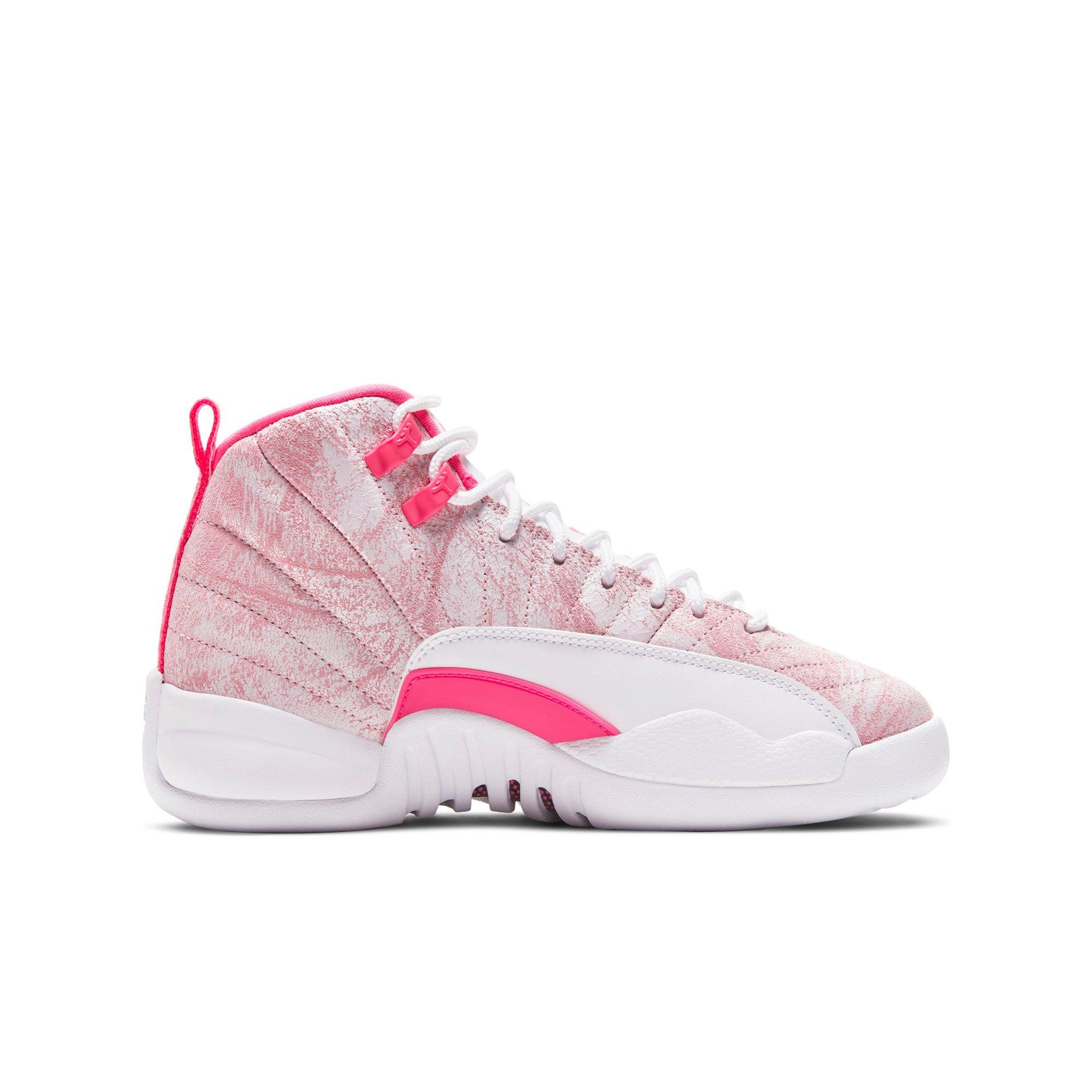 white and pink jordan 12