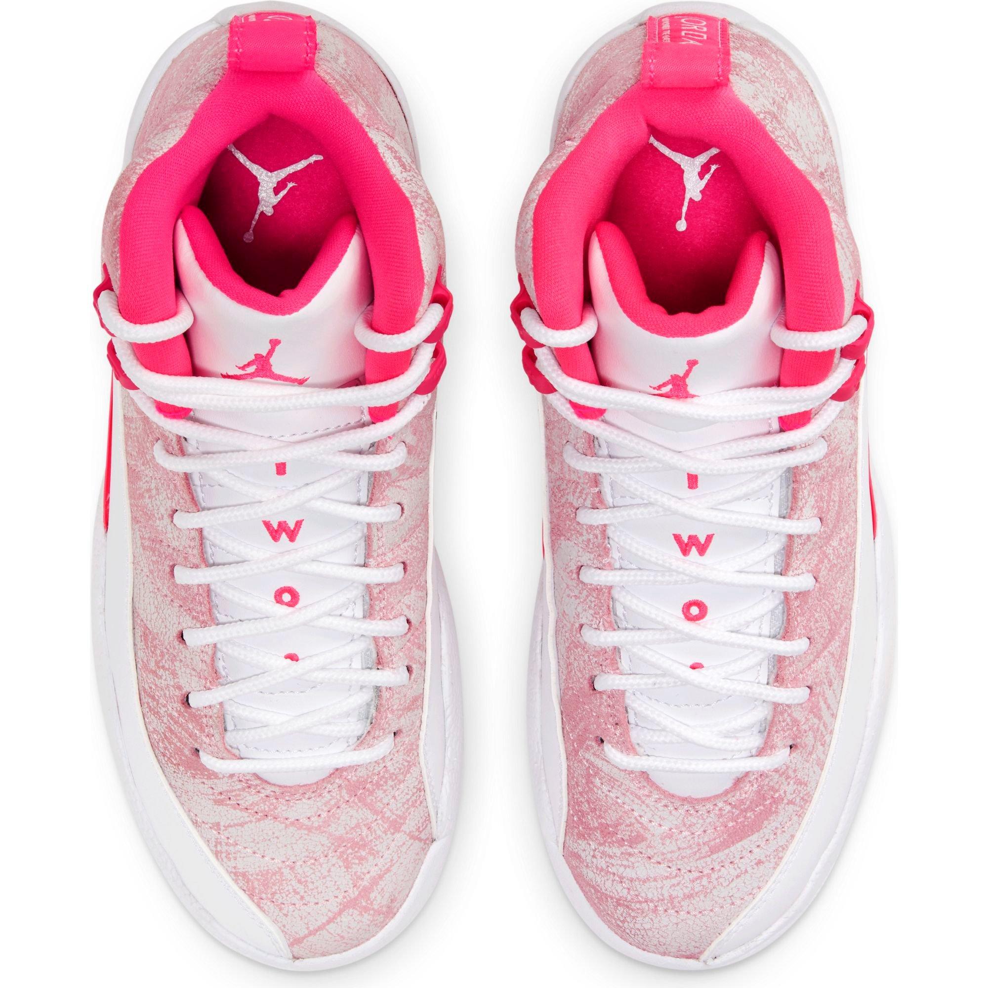 white and pink jordan 12