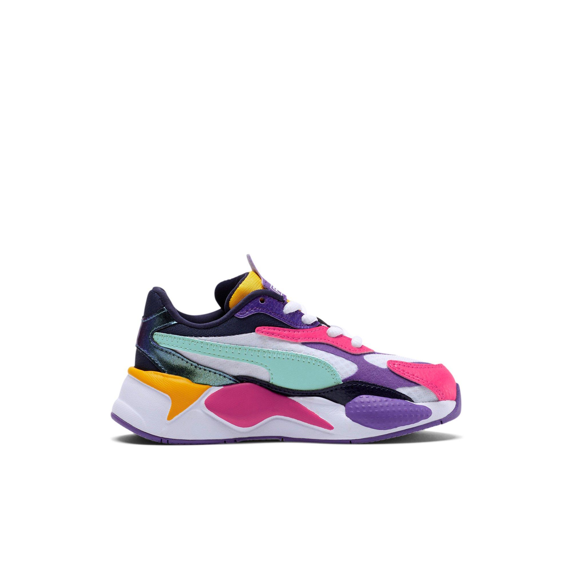 white and purple pumas