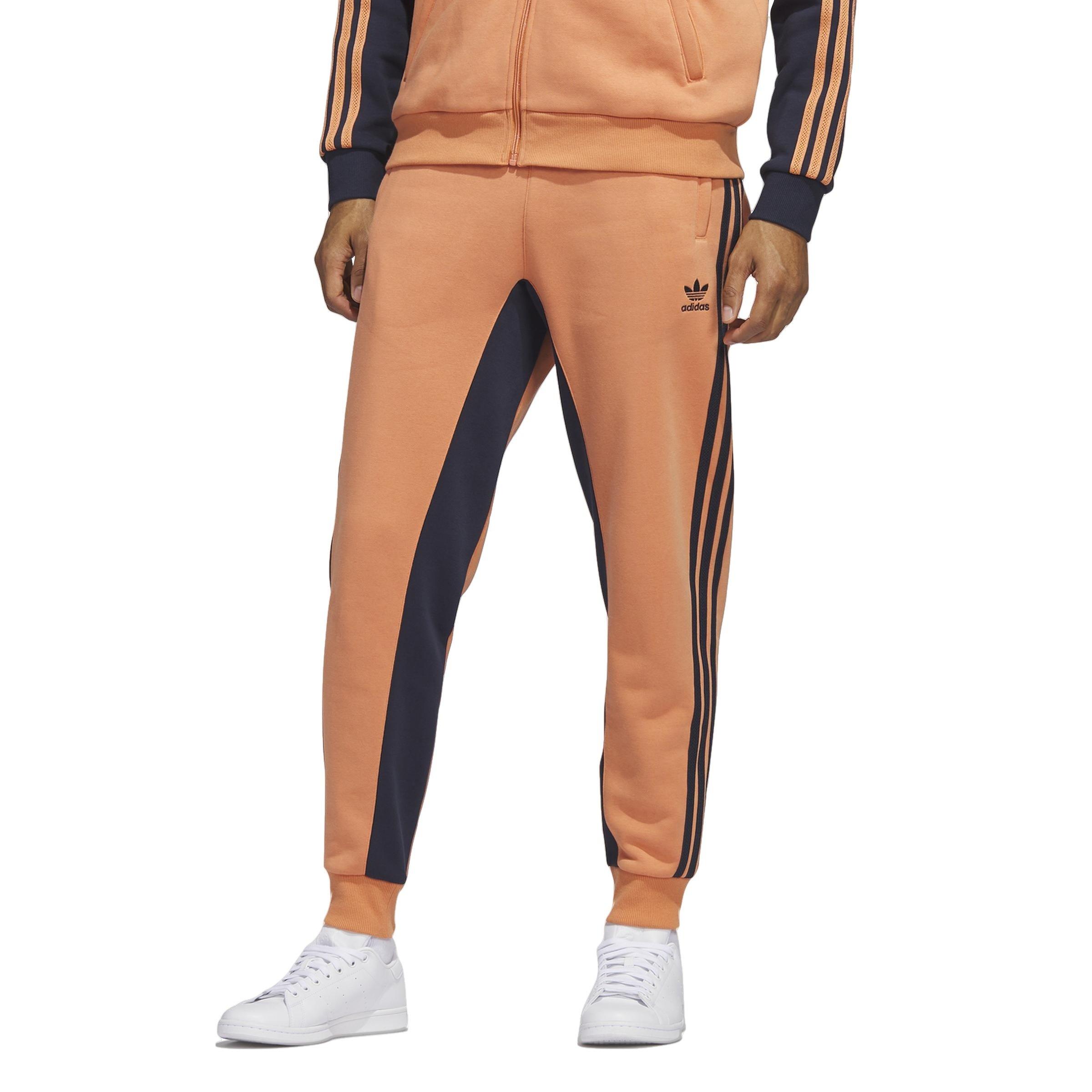 Adidas sst track hot sale pants orange