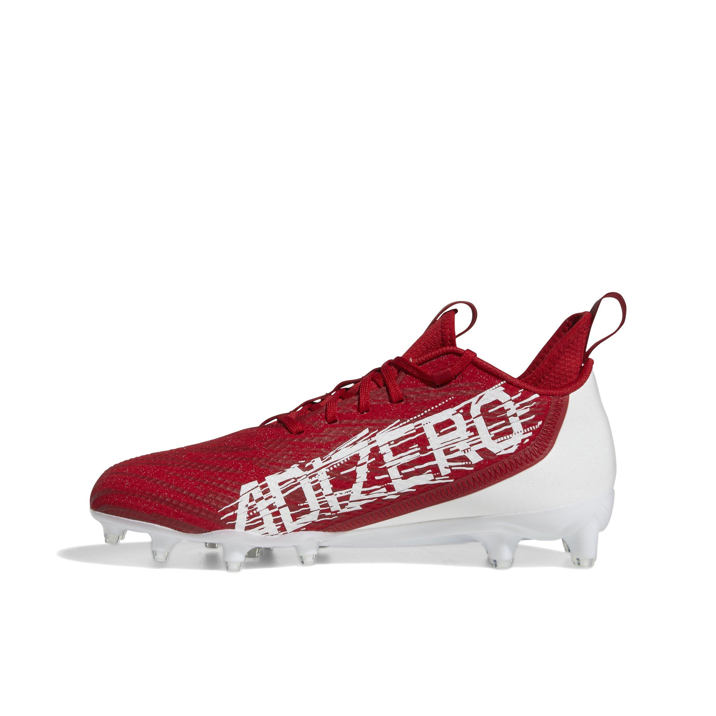 white and red adidas cleats