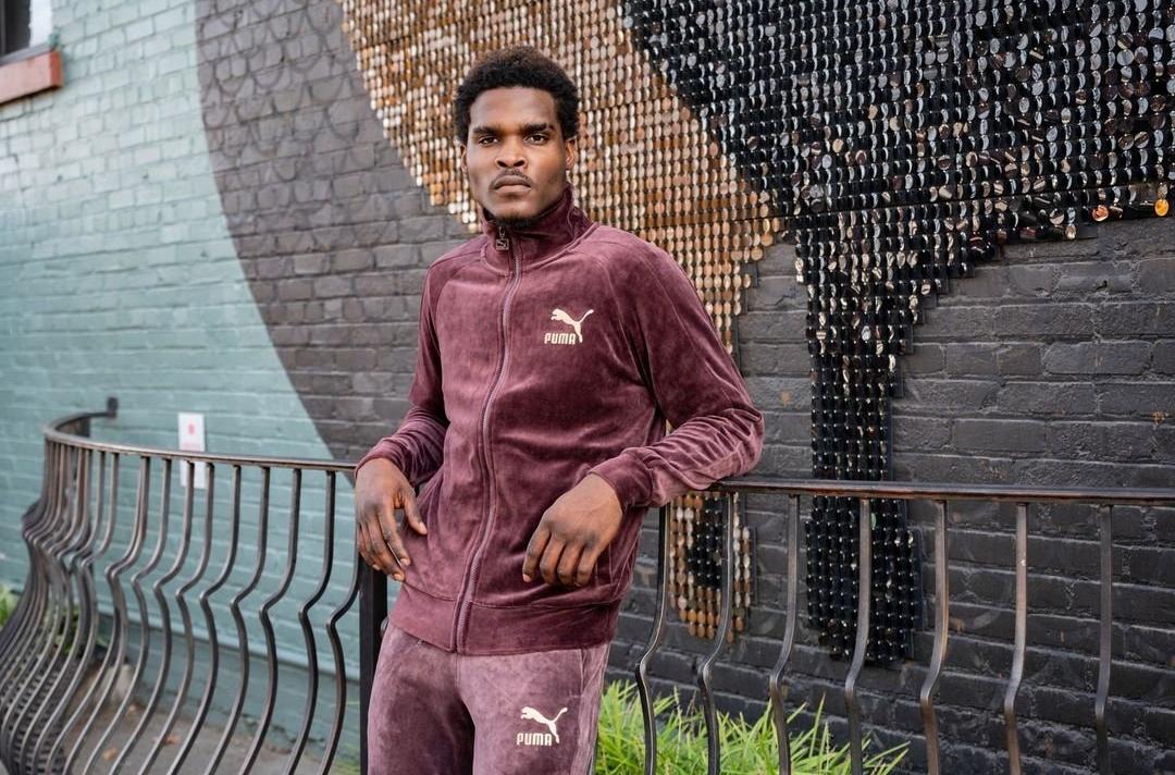 Man in PUMA velour jacket and pants