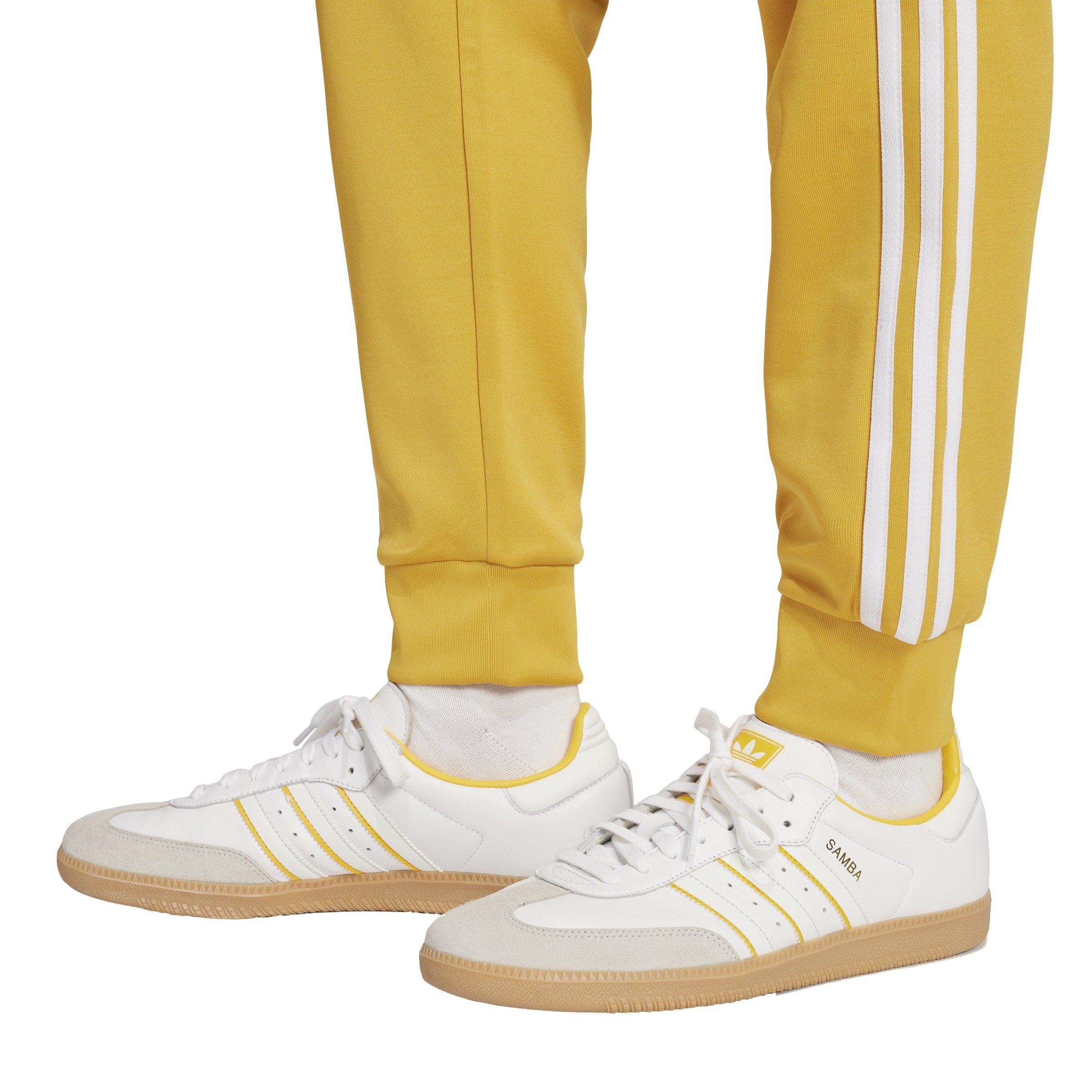 Originals adicolor superstar track pants yellow best sale