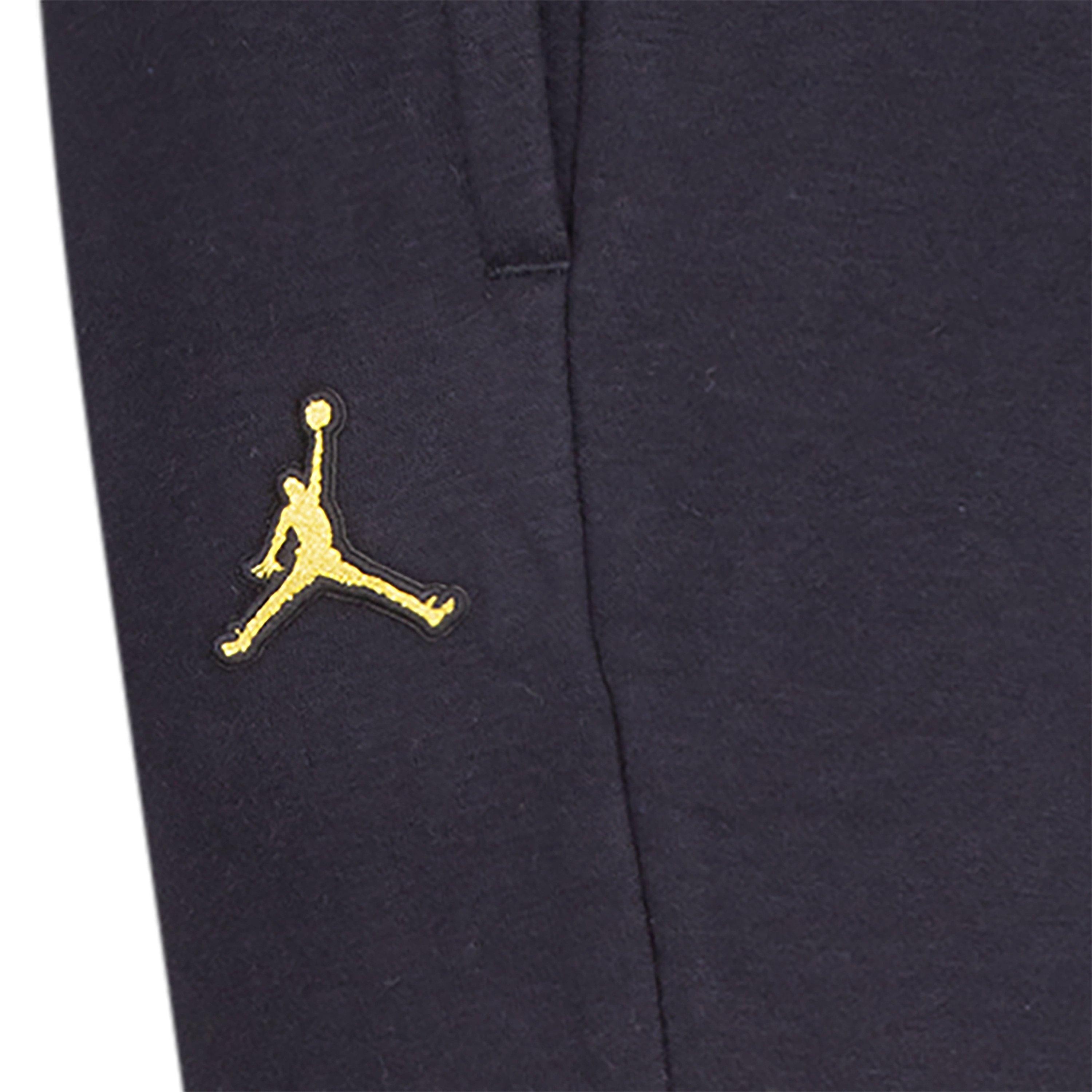 Black and gold jordan 2025 sweatpants