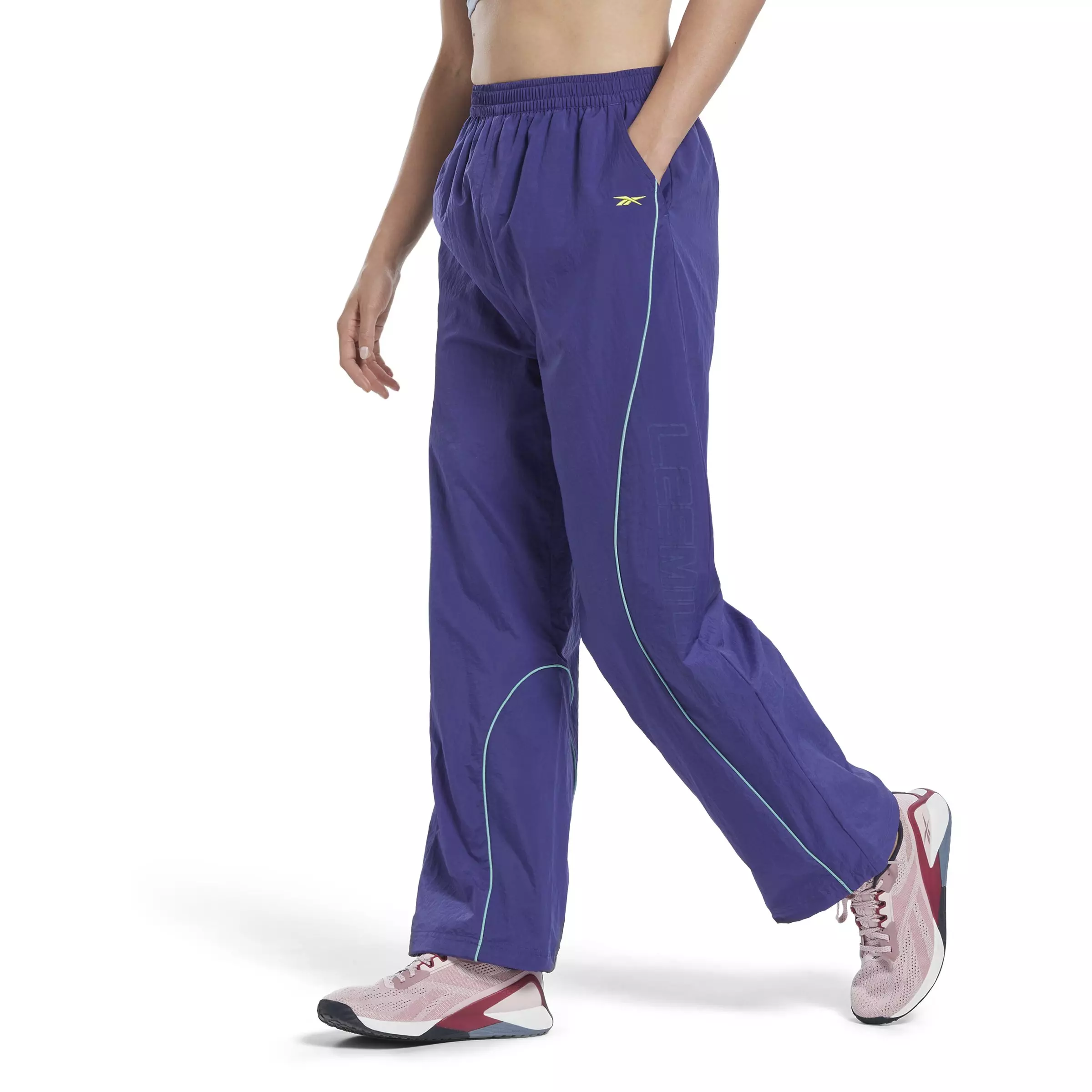 Buy Reebok Womens Les Mills Woven Track Pants Bold Purple