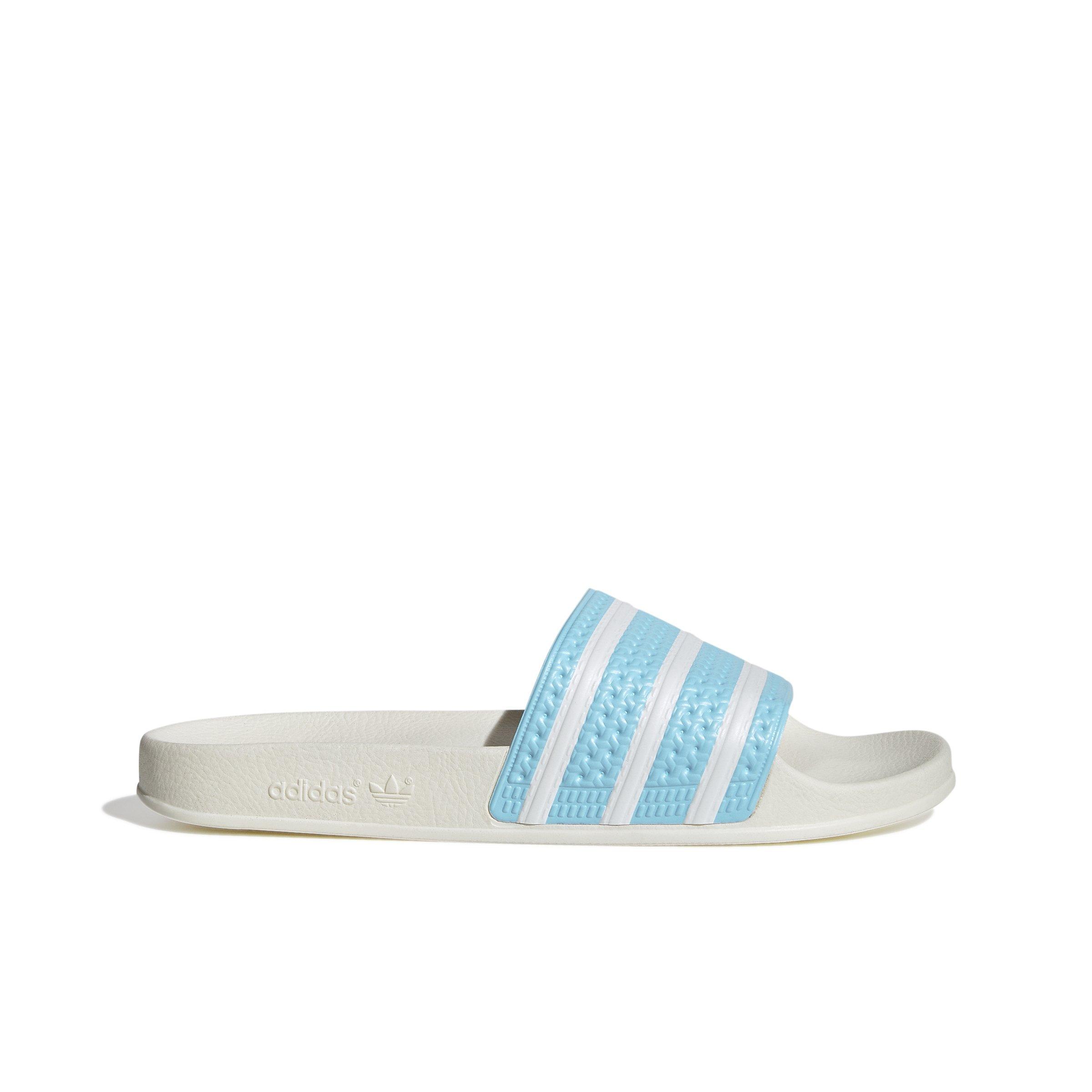 Adilette store blue slides