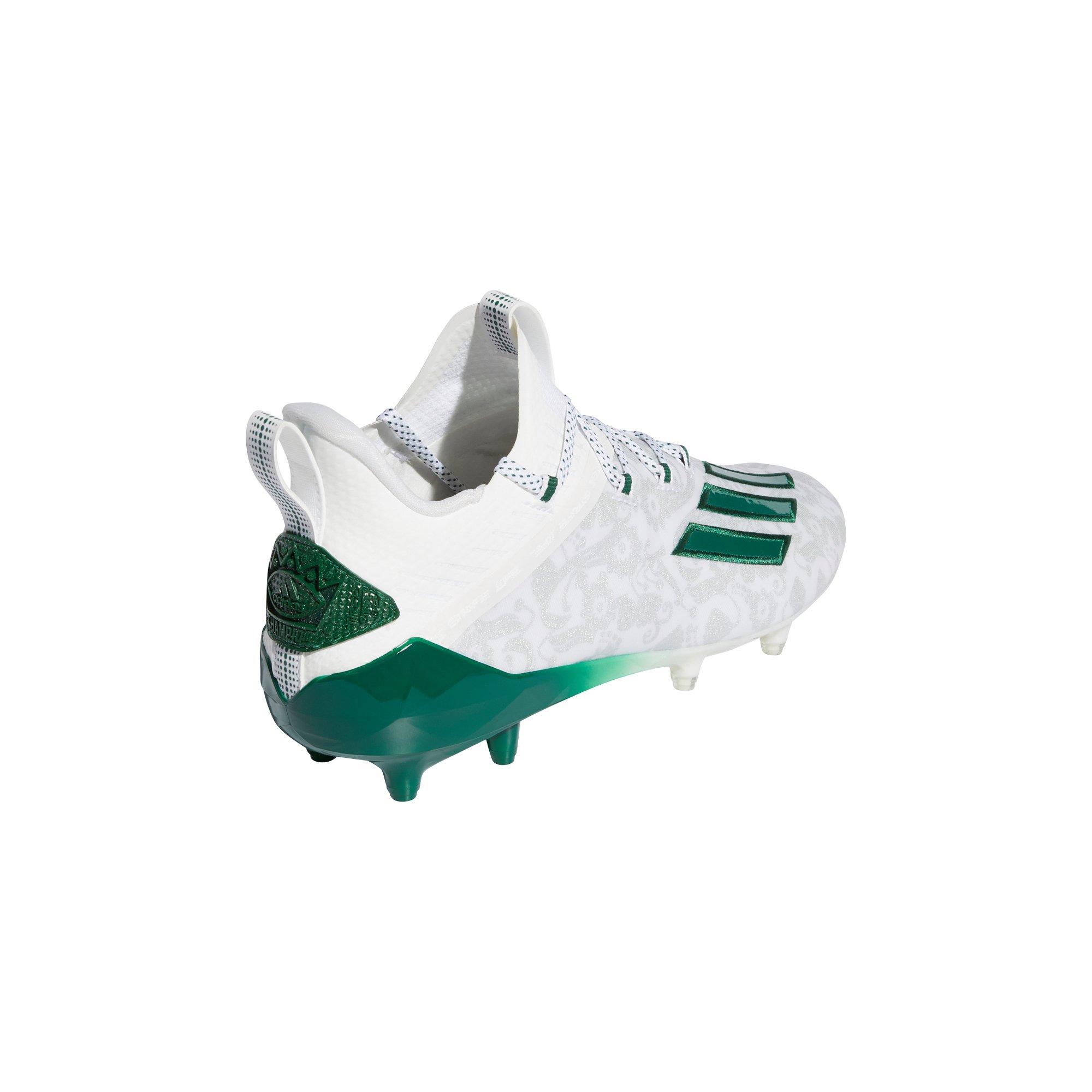 white and green adidas football cleats