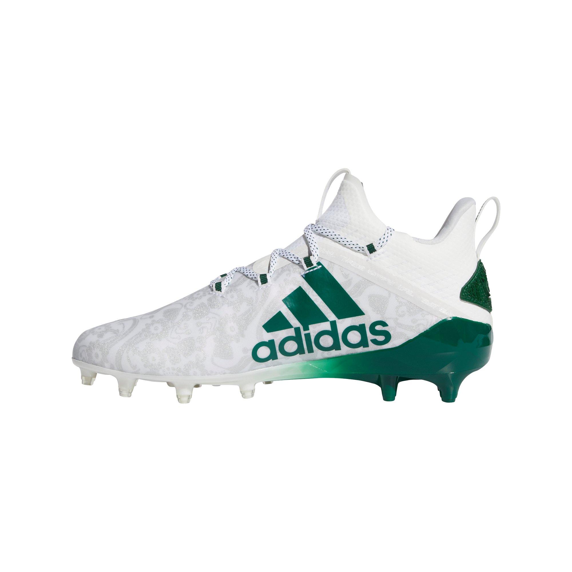 green and white adidas football cleats