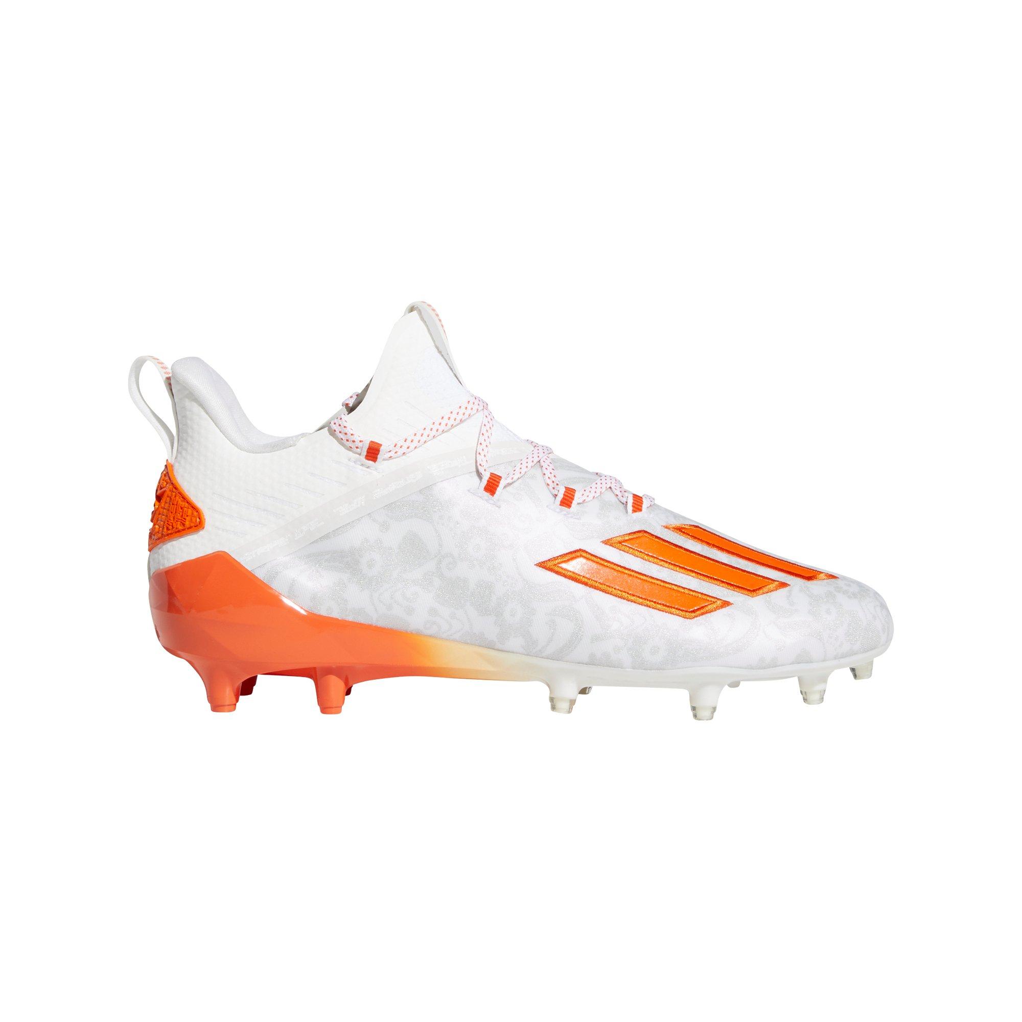 orange football cleats