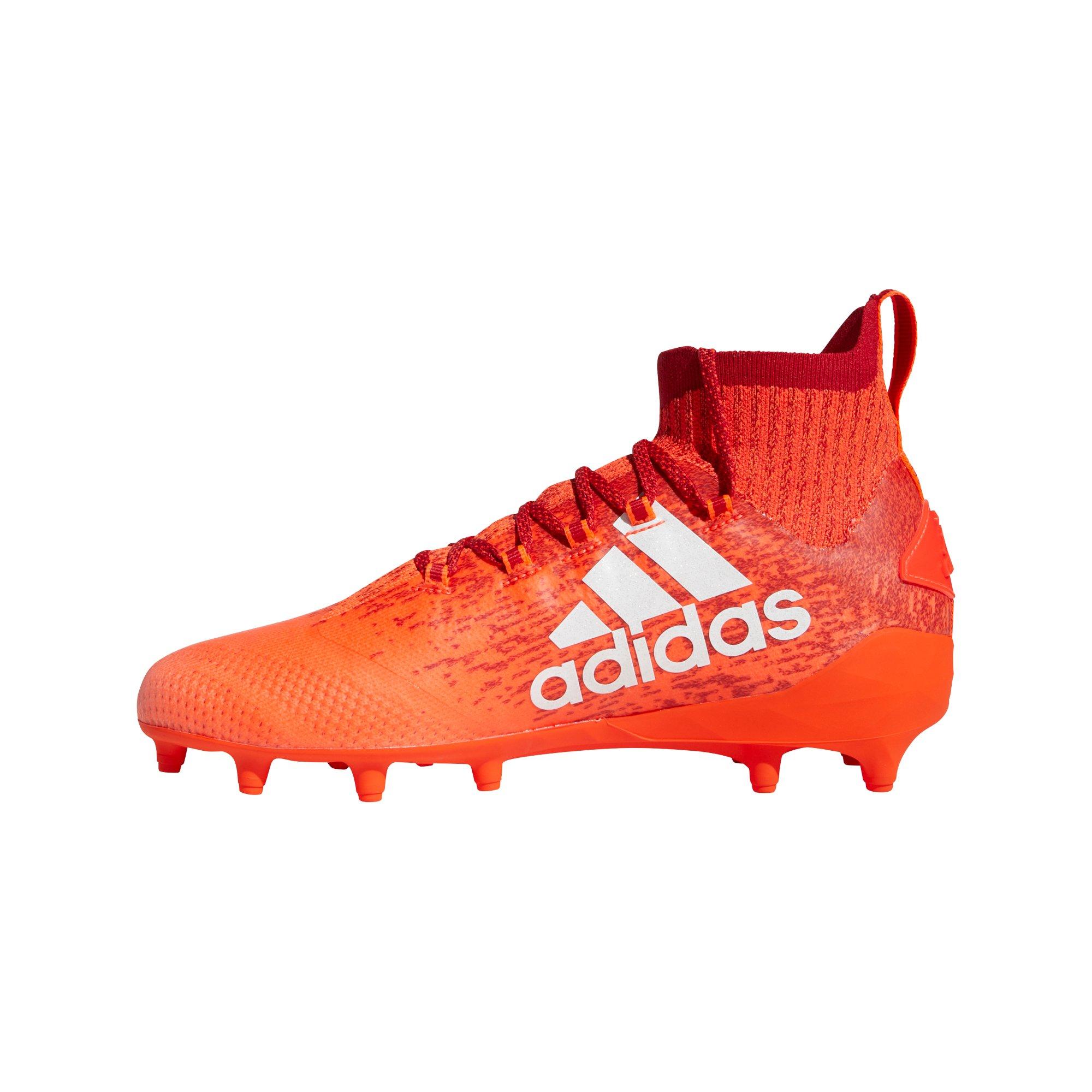 red adidas cleats
