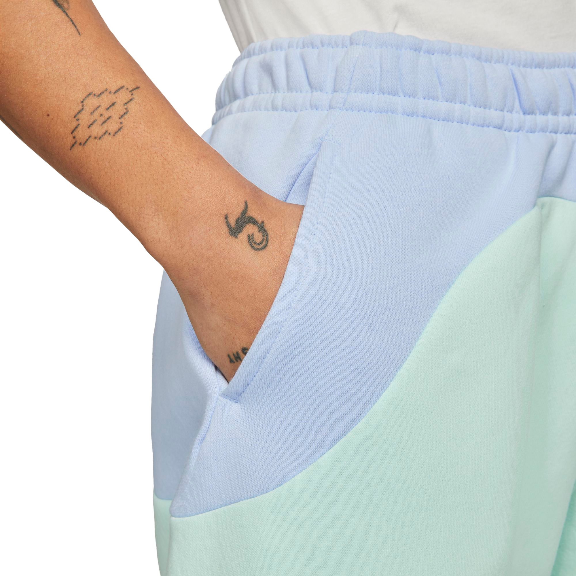 Nike Color Clash color block shorts in pale blue