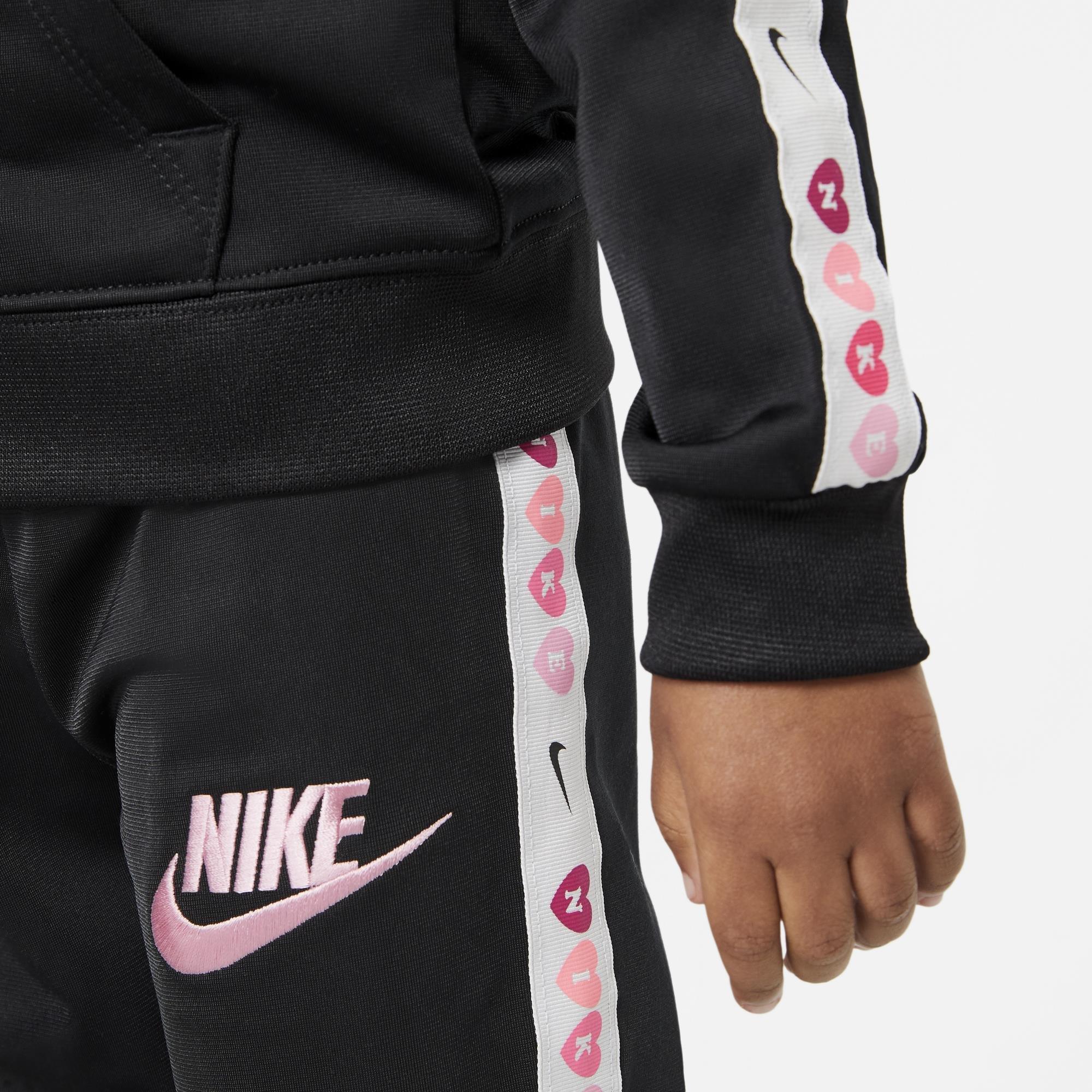 Shop Girl's Pink Nike Heart Taping Tricot Set
