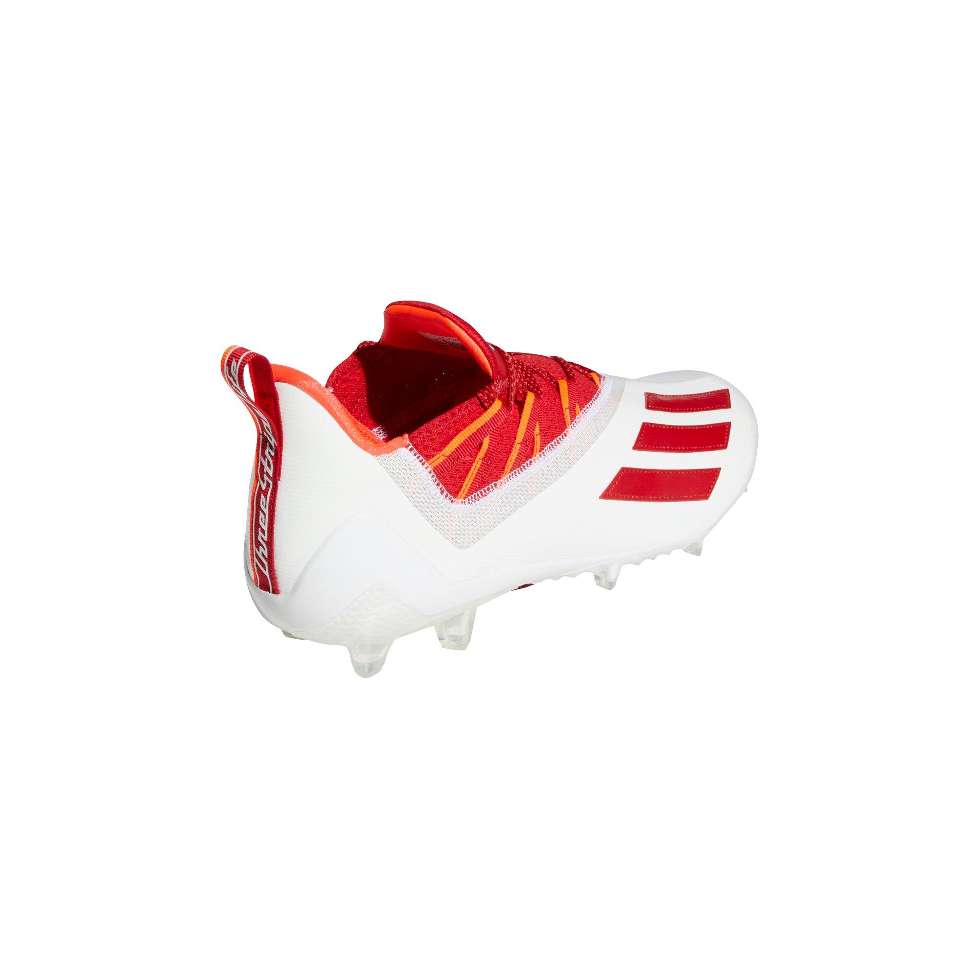 Red adizero football on sale cleats