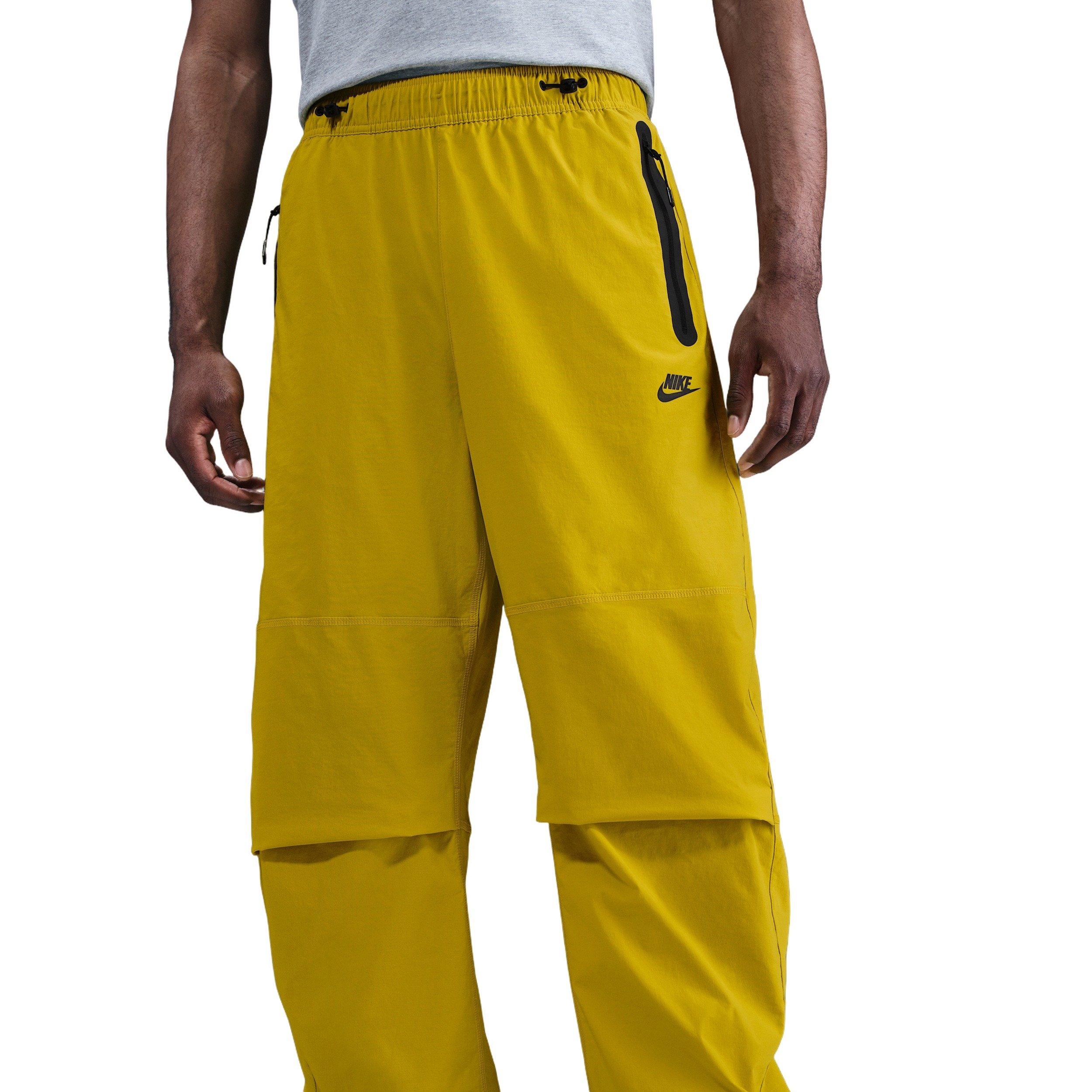 Nike Men's tech Woven Oversized Pants - YELLOW Thumbnail View 1