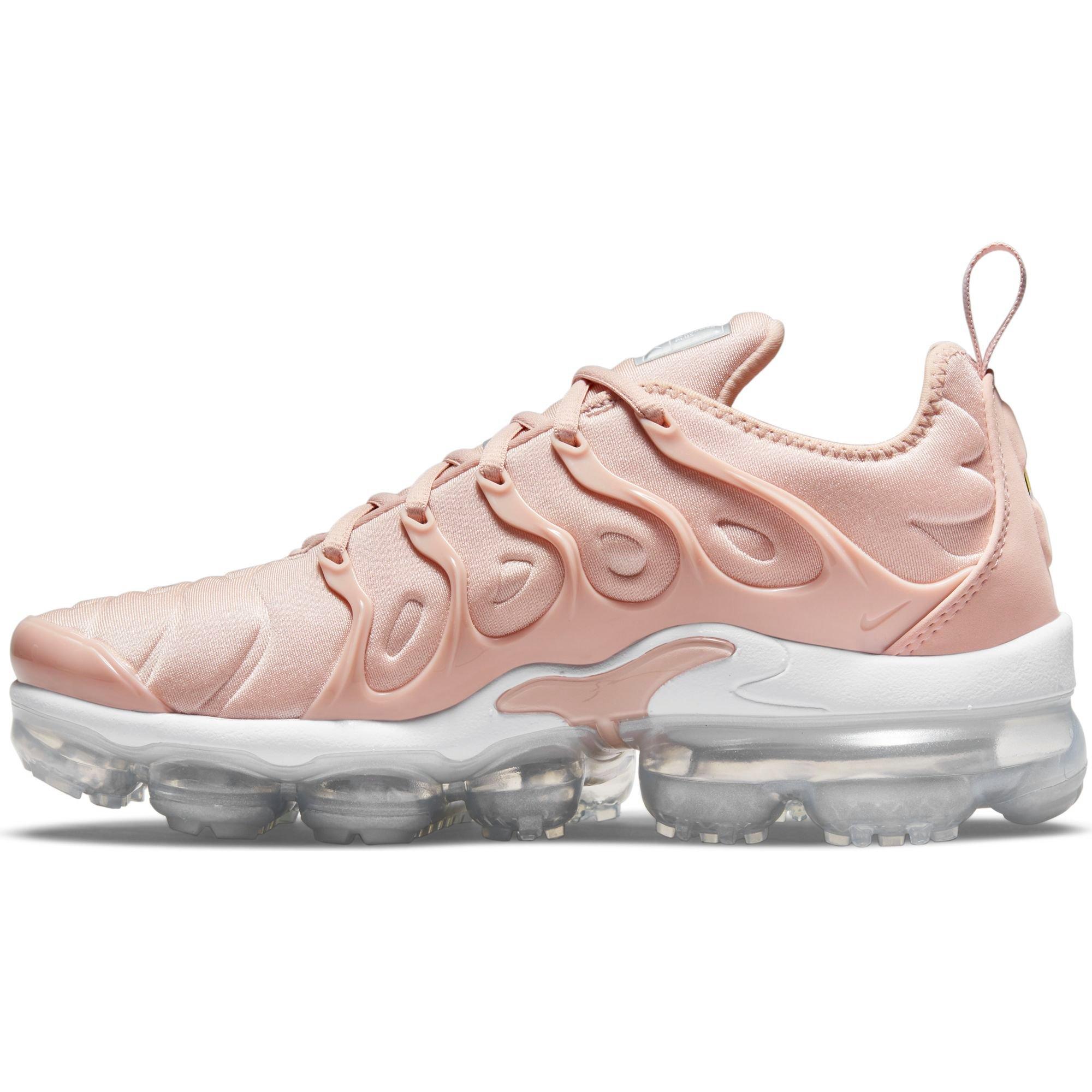 white and pink vapormax plus