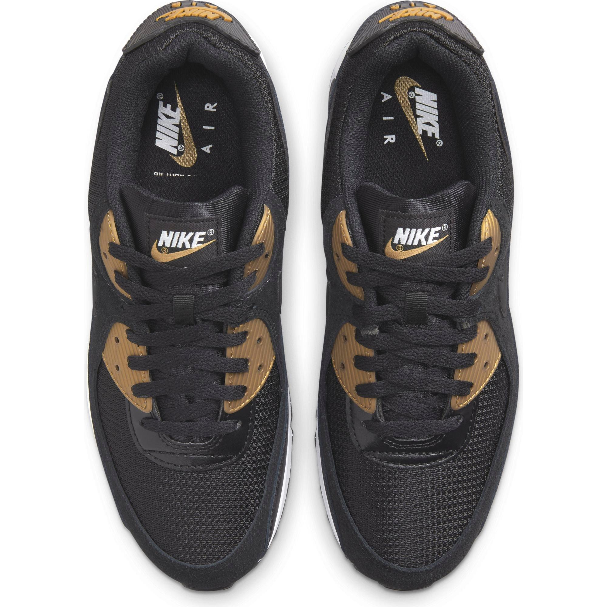 Gold and shop black nike shoes