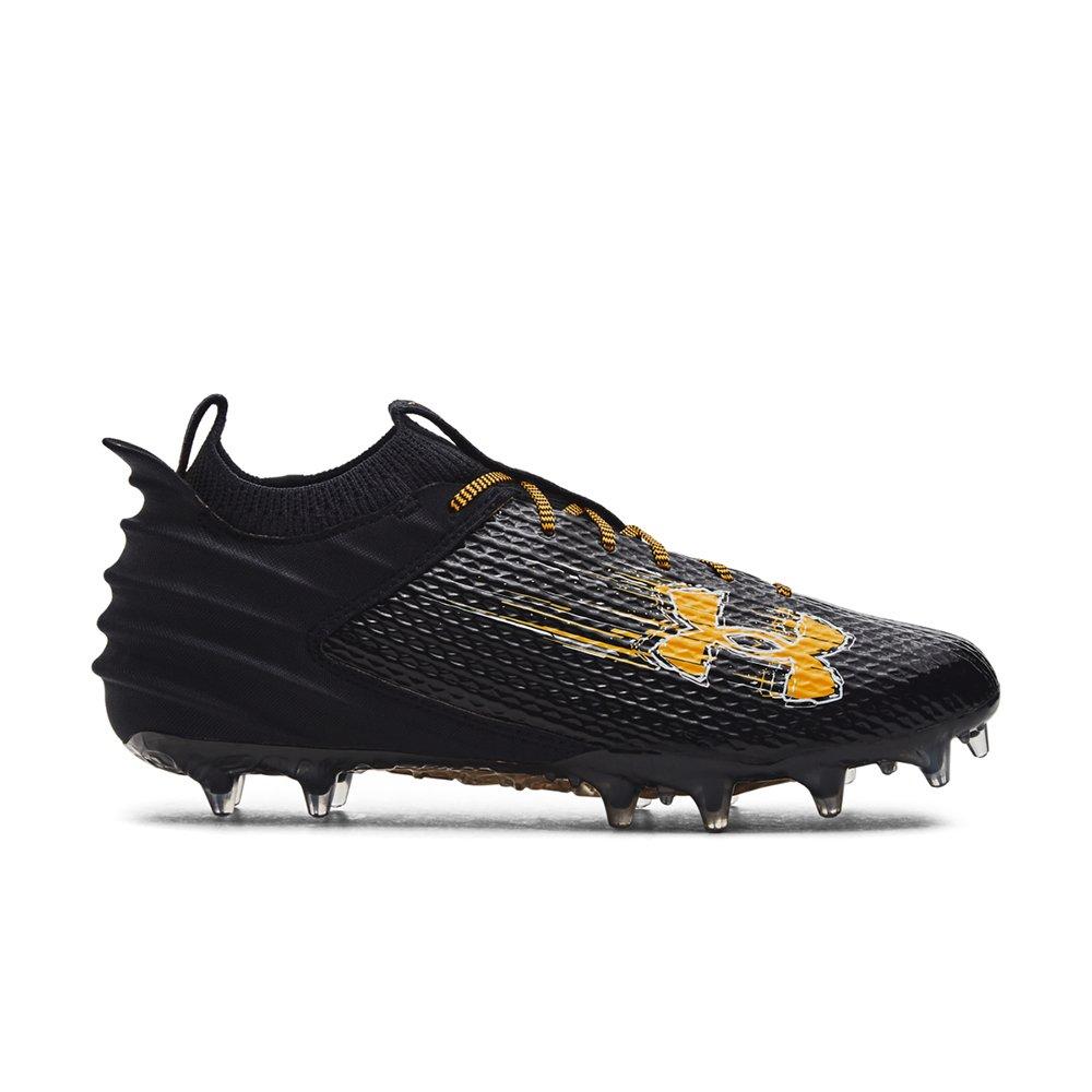 Gold and black store under armour cleats