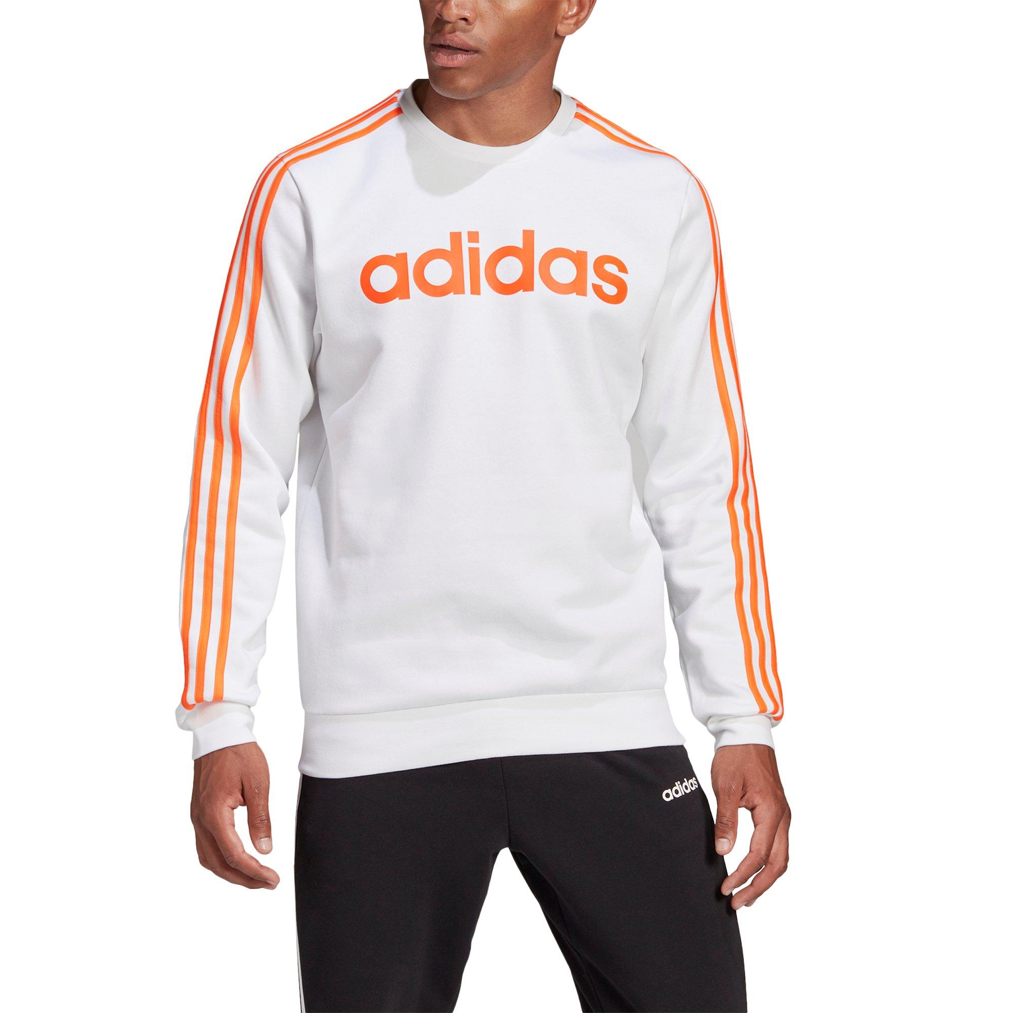white and orange adidas shirt
