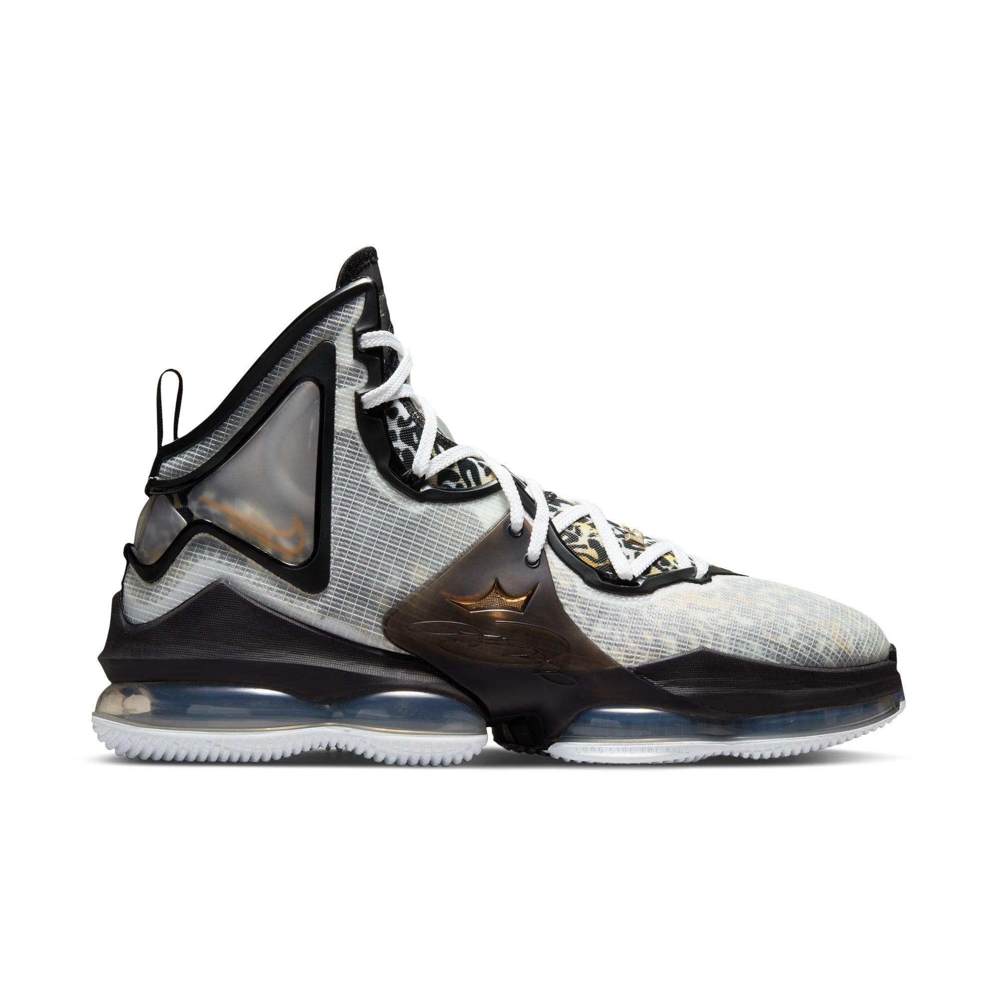 Black white store and gold lebrons