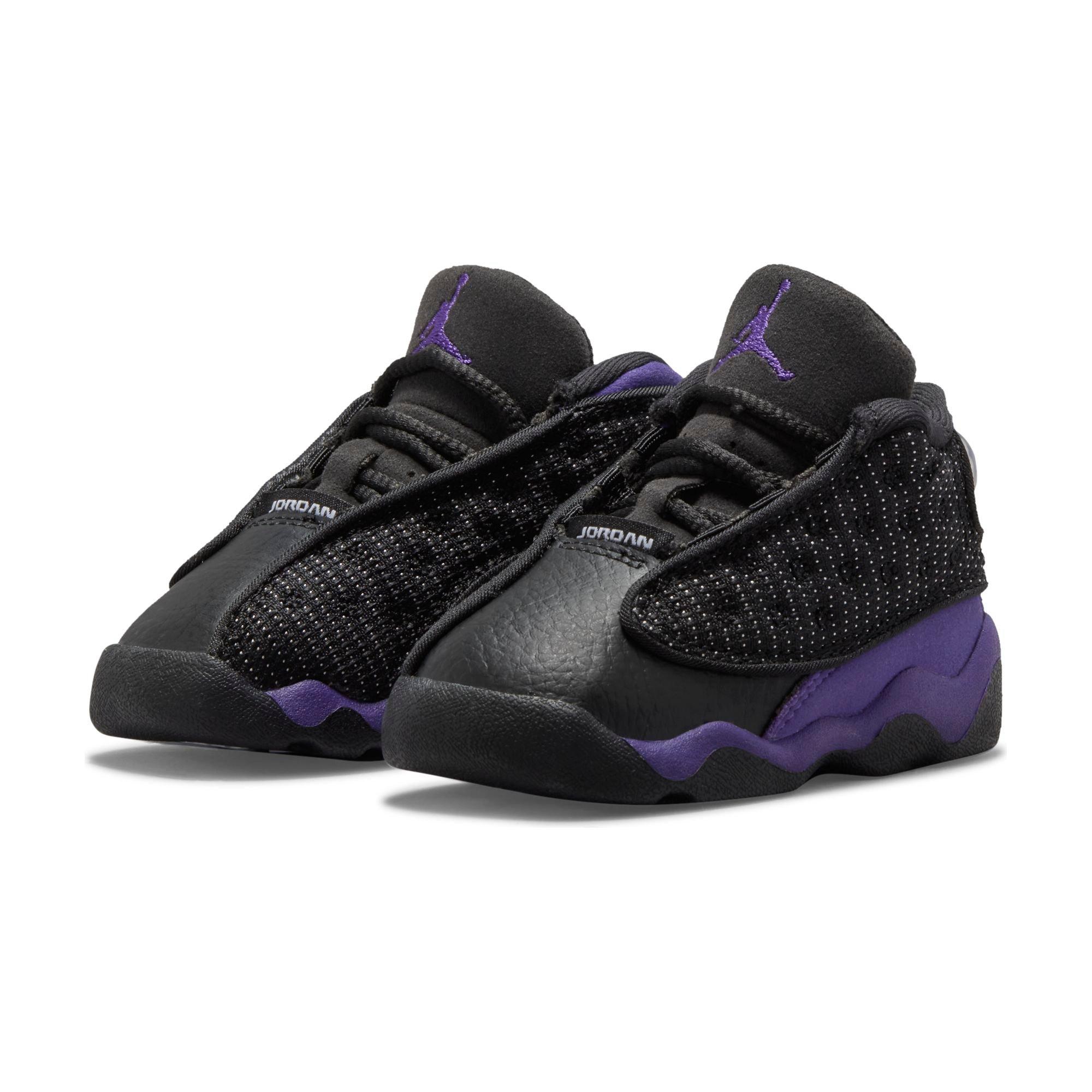 black jordans with purple