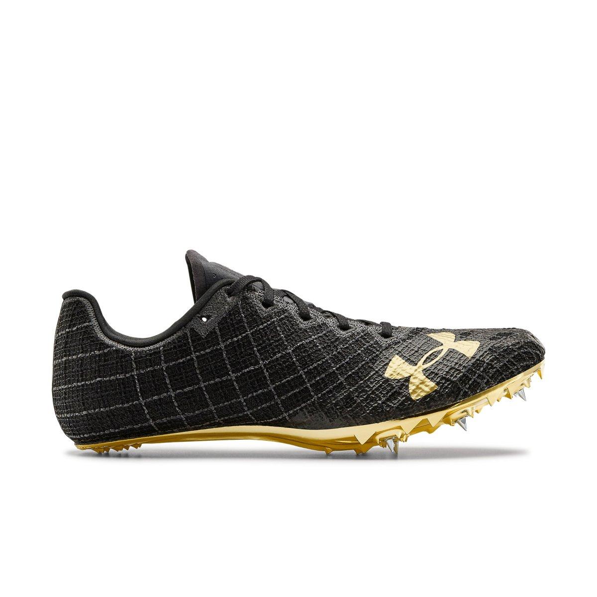 track spikes with gold bottoms