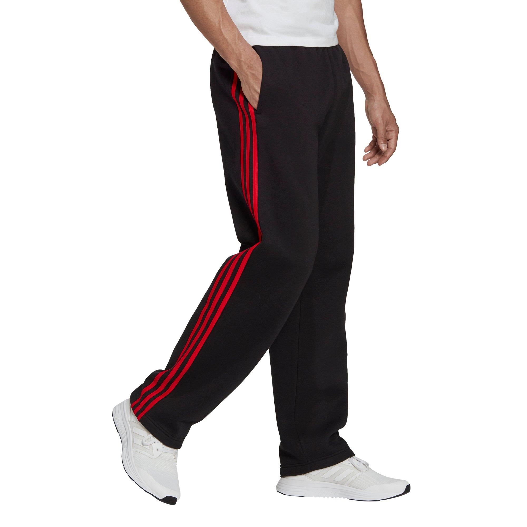 Adidas pants black sales with red stripes