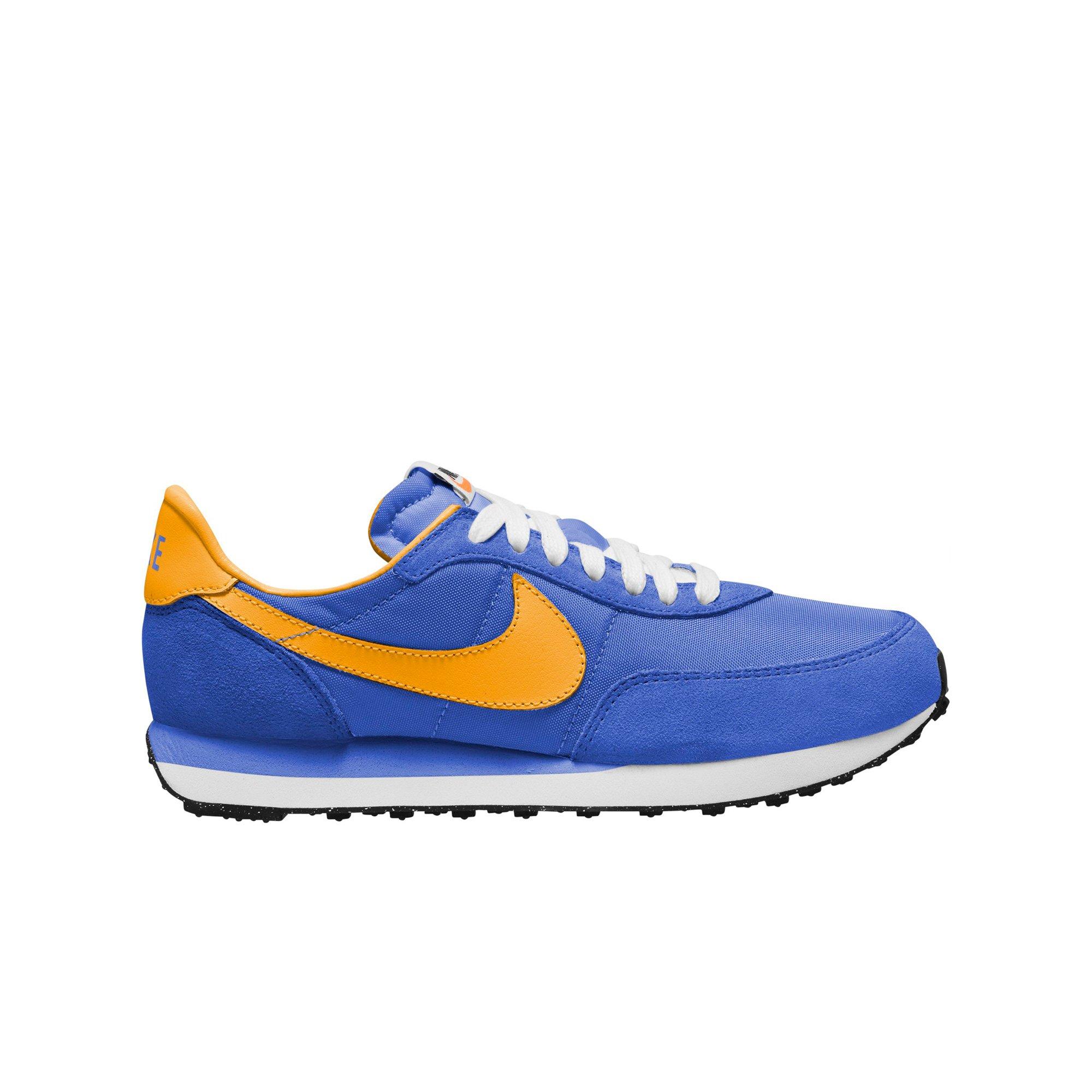 blue and yellow nike waffle