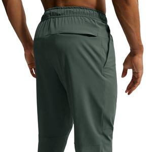 Nike Men's Unlimited Dri-FIT Zippered Cuff Versatile Pants - GREEN