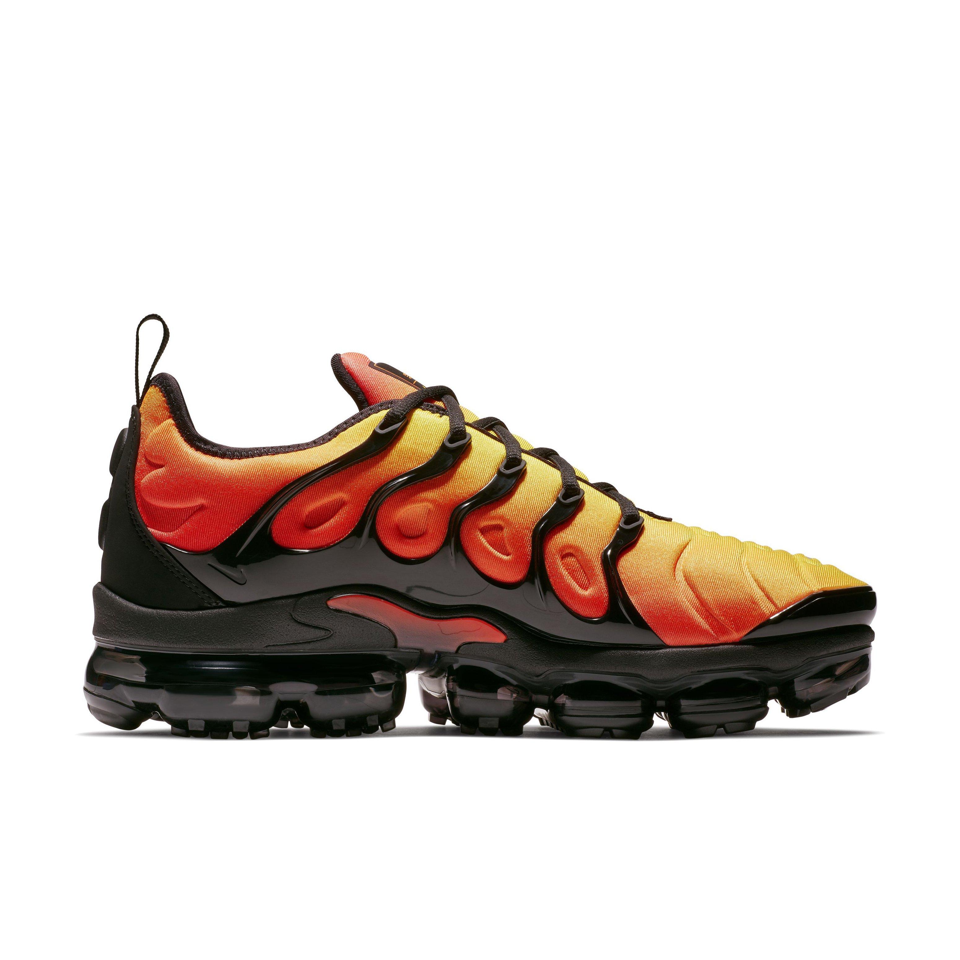 Orange and store yellow vapormax plus