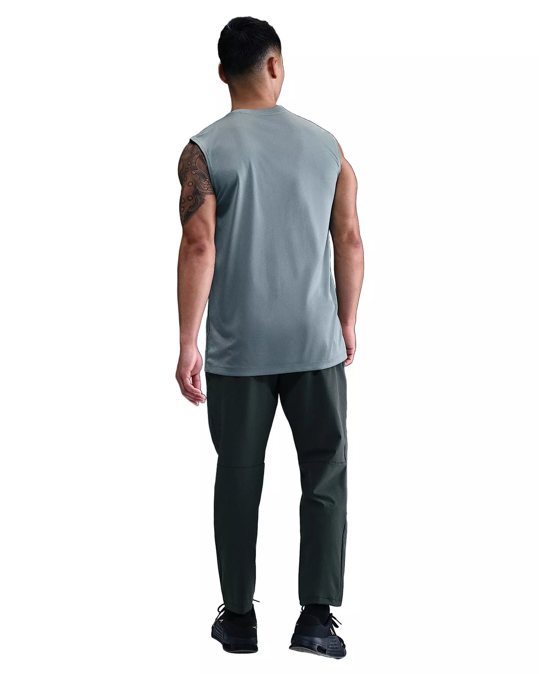Nike Men's Unlimited Dri-FIT Tapered Leg Versatile Pants -Green - GREEN