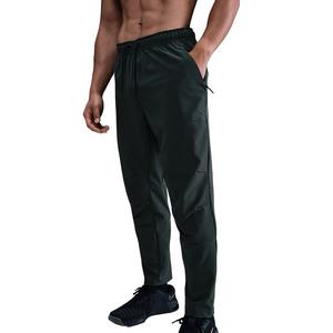 Nike Men's Unlimited Dri-FIT Tapered Leg Versatile Pants -Green