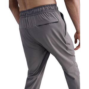 Nike Men's Unlimited Dri-FIT Zippered Cuff Versatile Pants -Stone Grey