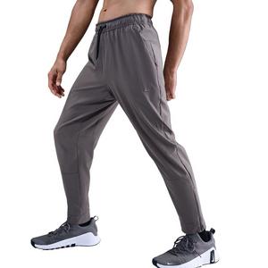 Nike Men's Unlimited Dri-FIT Zippered Cuff Versatile Pants -Stone Grey