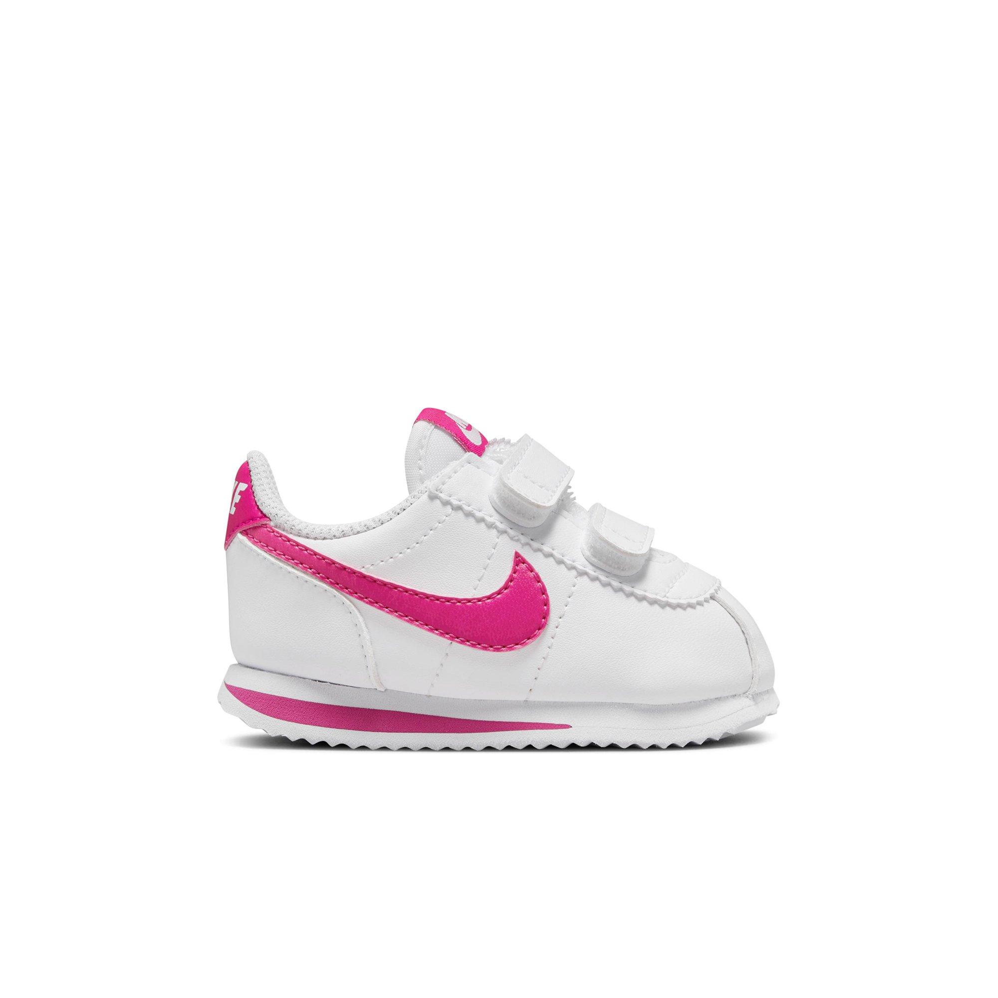 Nike cortez white shop with pink swoosh