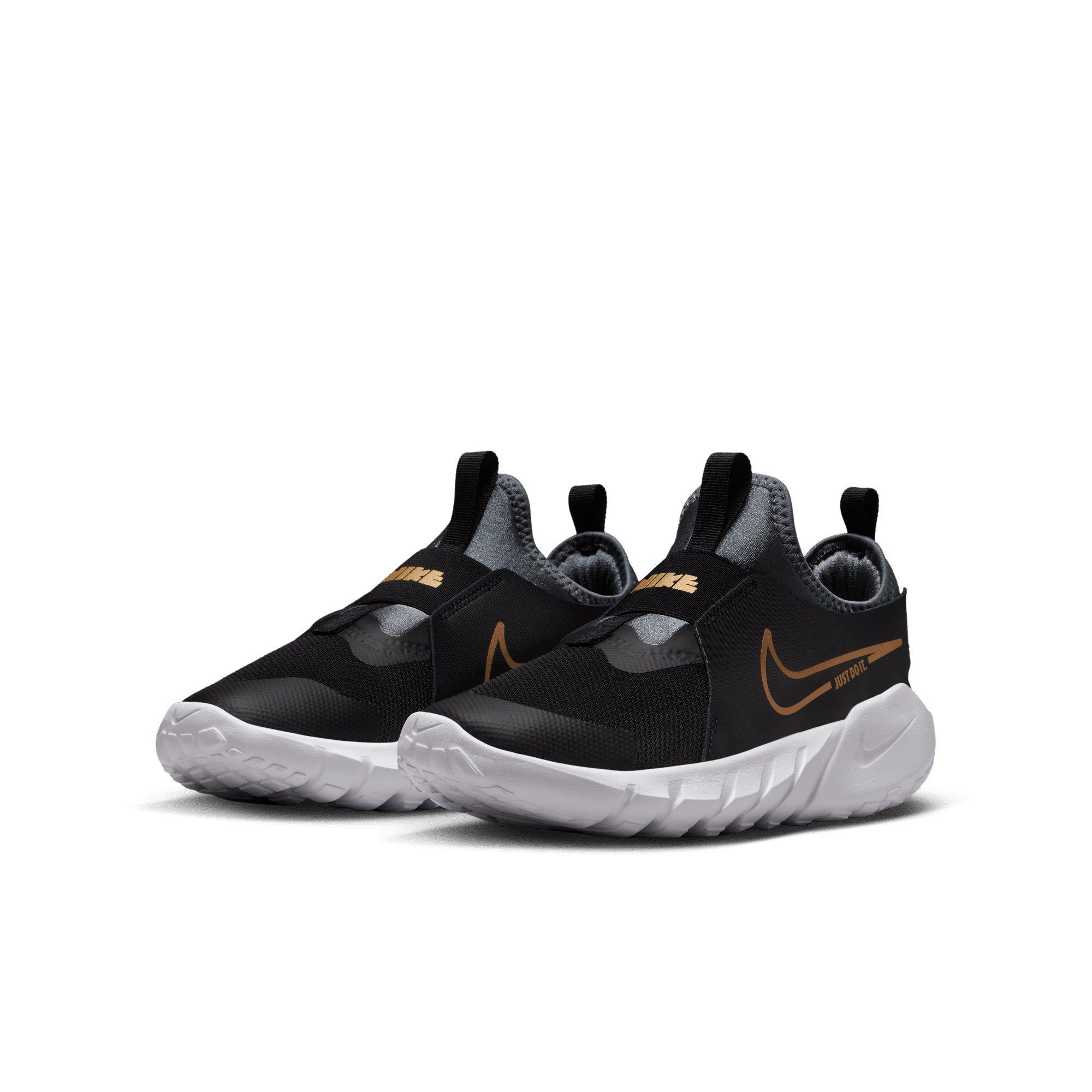 black and gold nike runners