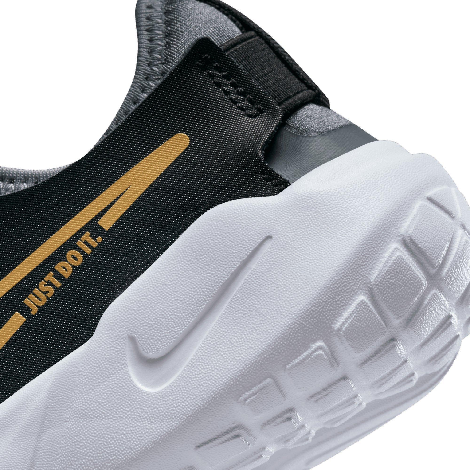 Nike flex hotsell black and gold