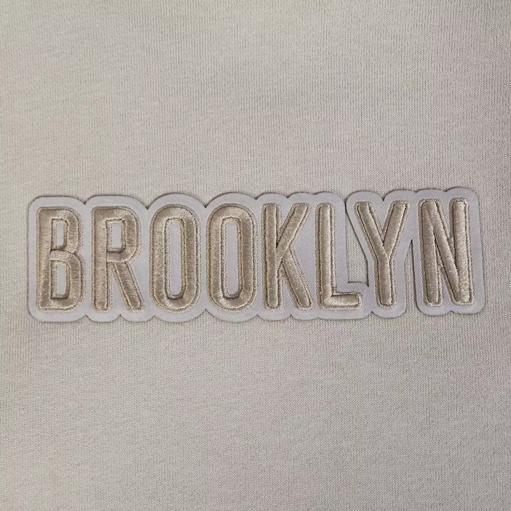 Pro Standard Men's NBA Brooklyn Nets Wingspan Drop Shoulder Fleece Hoodie - TAN