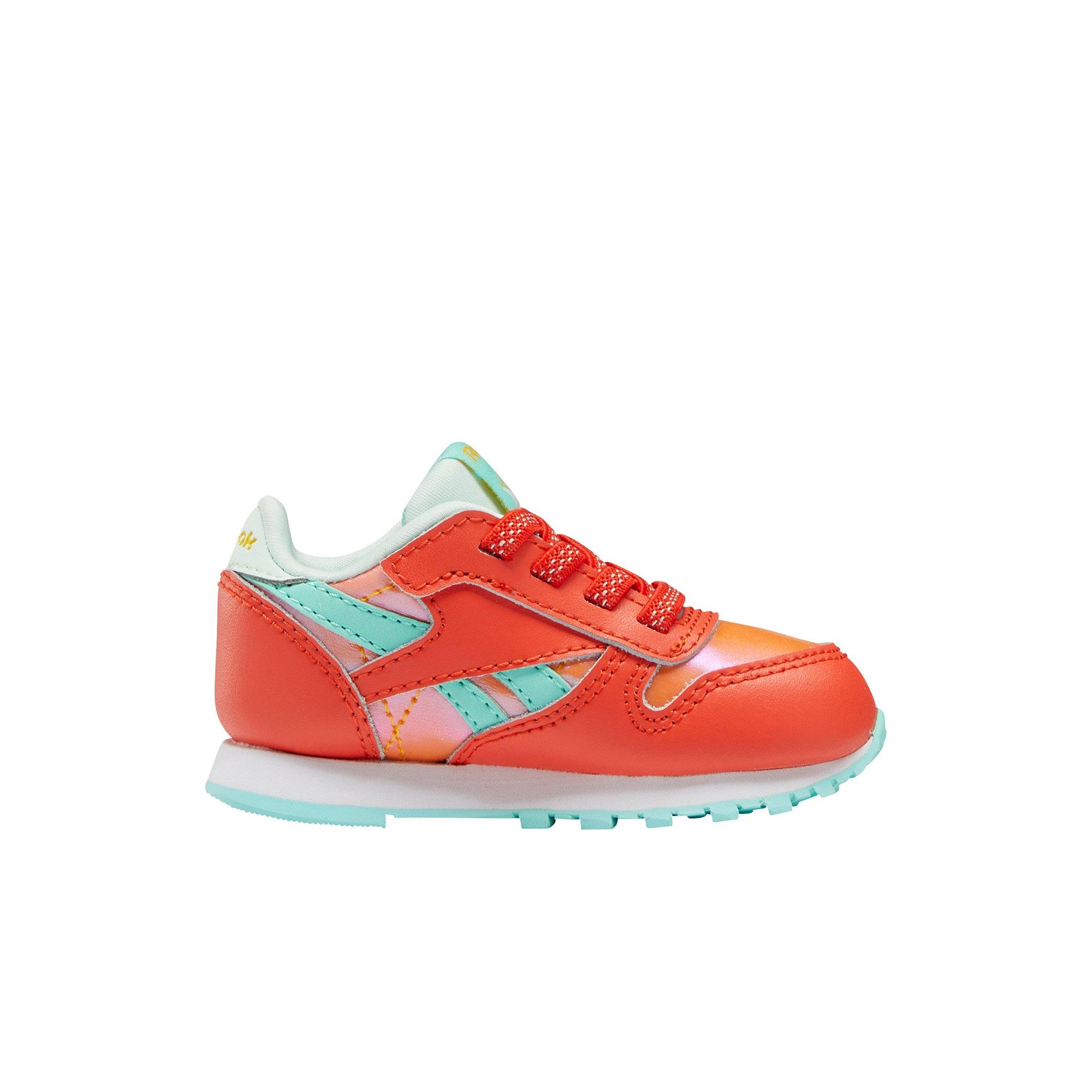 orange reebok trainers