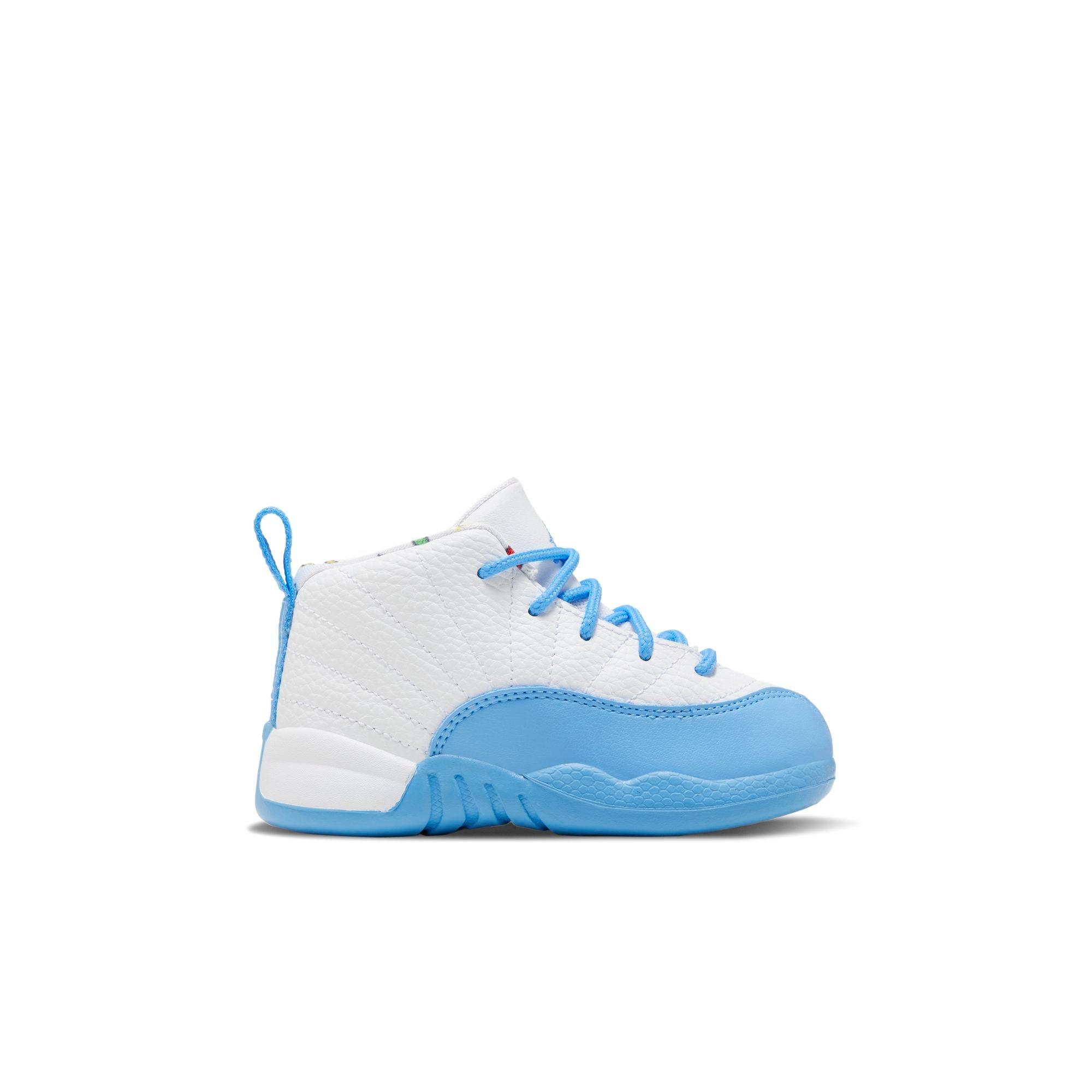 white and blue jordan 12