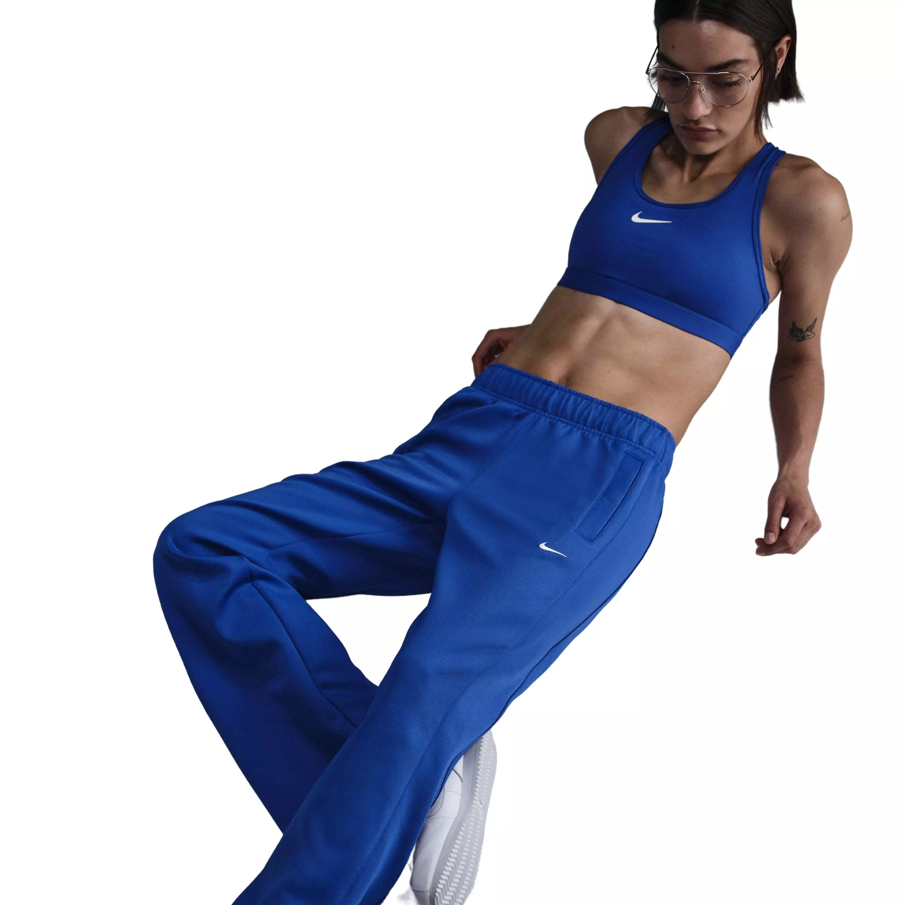 Nike Women's Sportswear Windrunner Mid-Rise Slim Knit Pants-Blue - BLUE