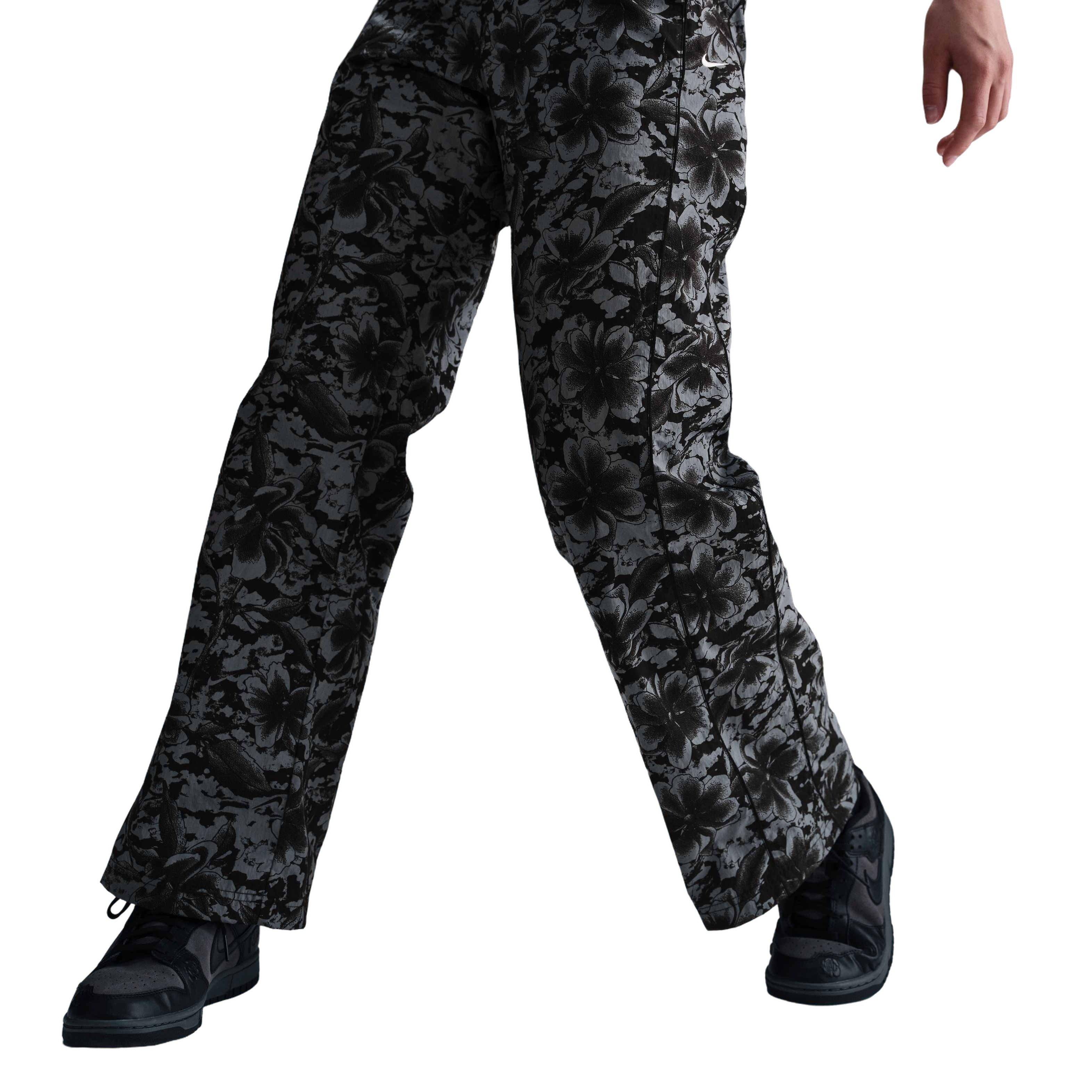 Nike Women's Sportswear Windrunner UV Protection Mid-Rise Woven Printed Pants-Black - BLACK Thumbnail View 1