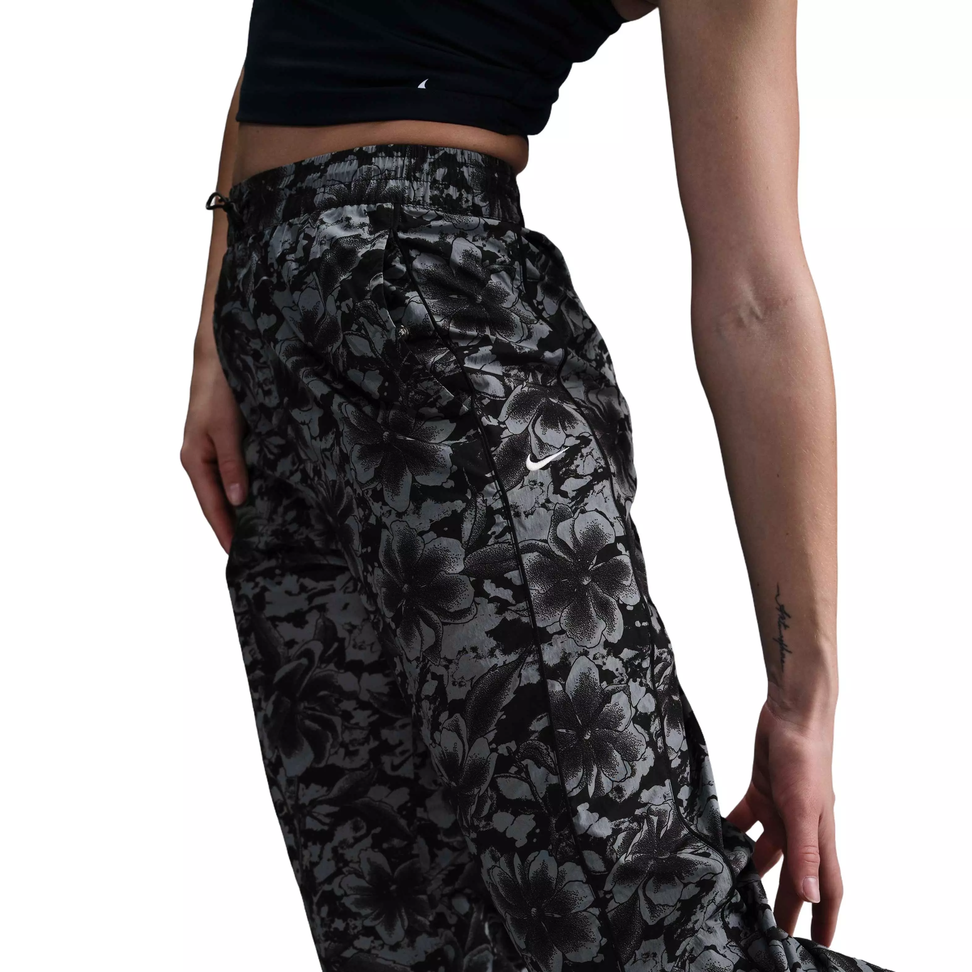 Nike Women's Sportswear Windrunner UV Protection Mid-Rise Woven Printed Pants-Black - BLACK