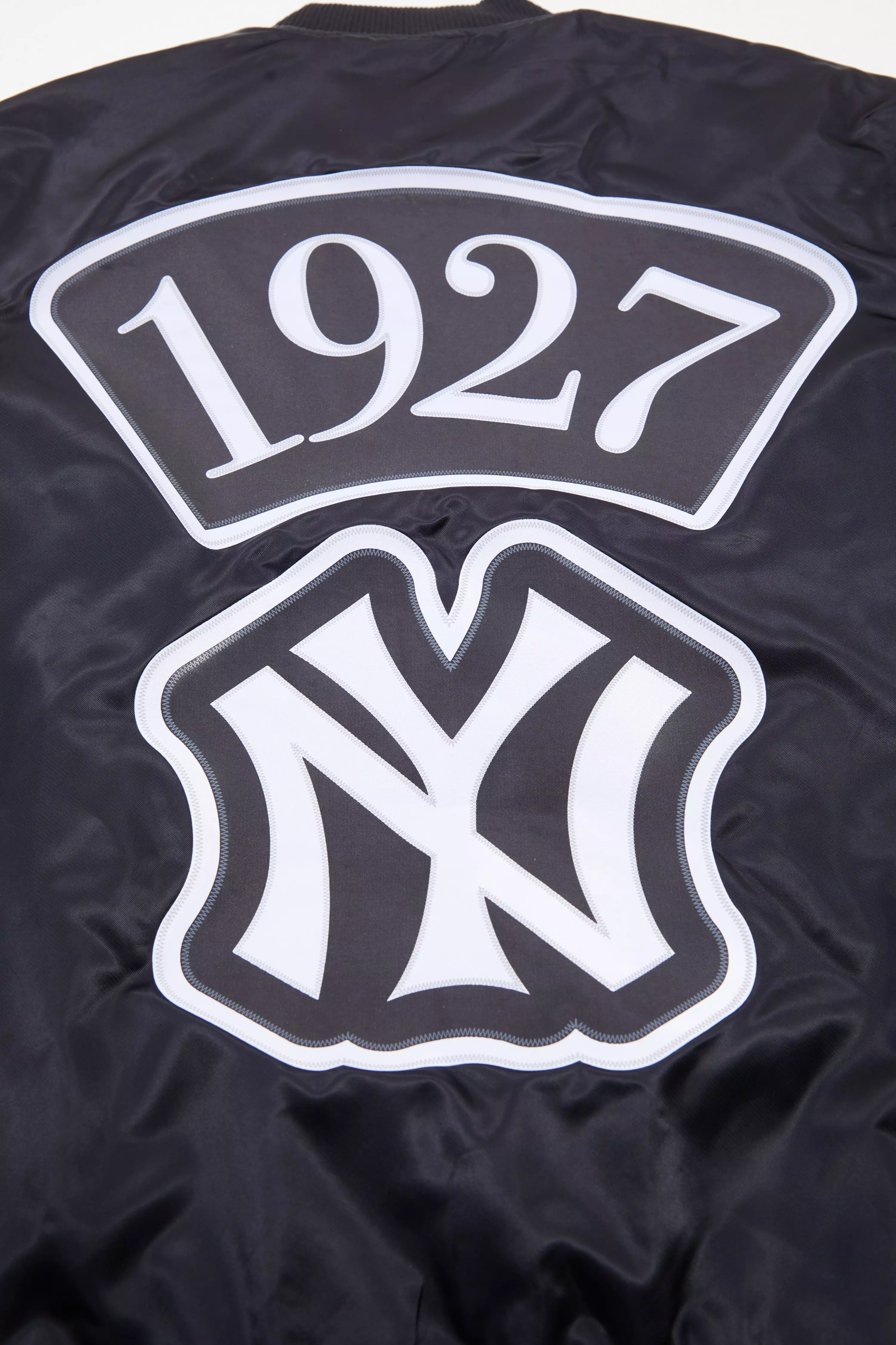 Pro Standard Men's MLB New York Yankees Murderers Row Big Logo Satin Jacket - Black - BLACK